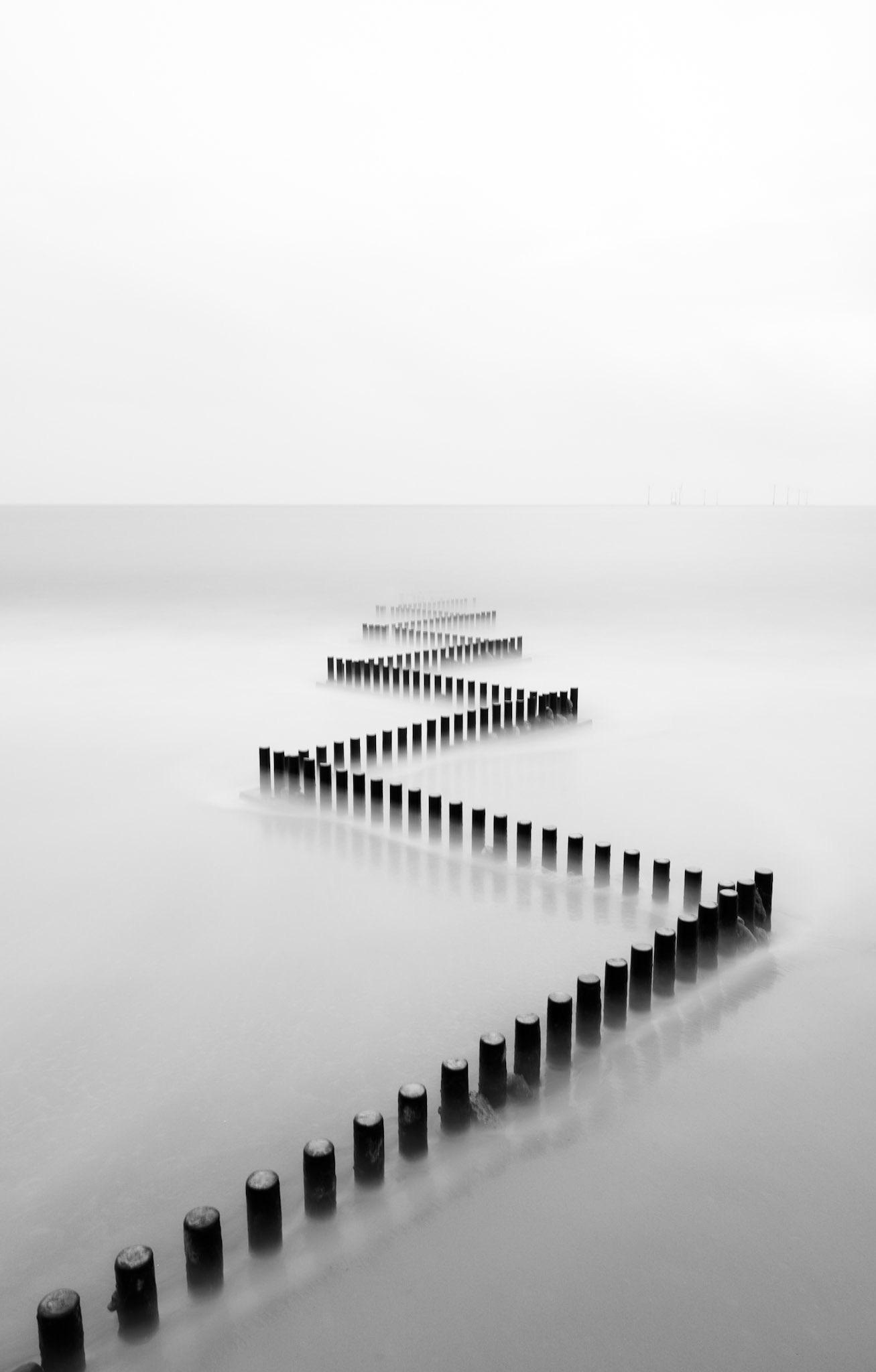 Long exposure black and white sea defence, Norfolk