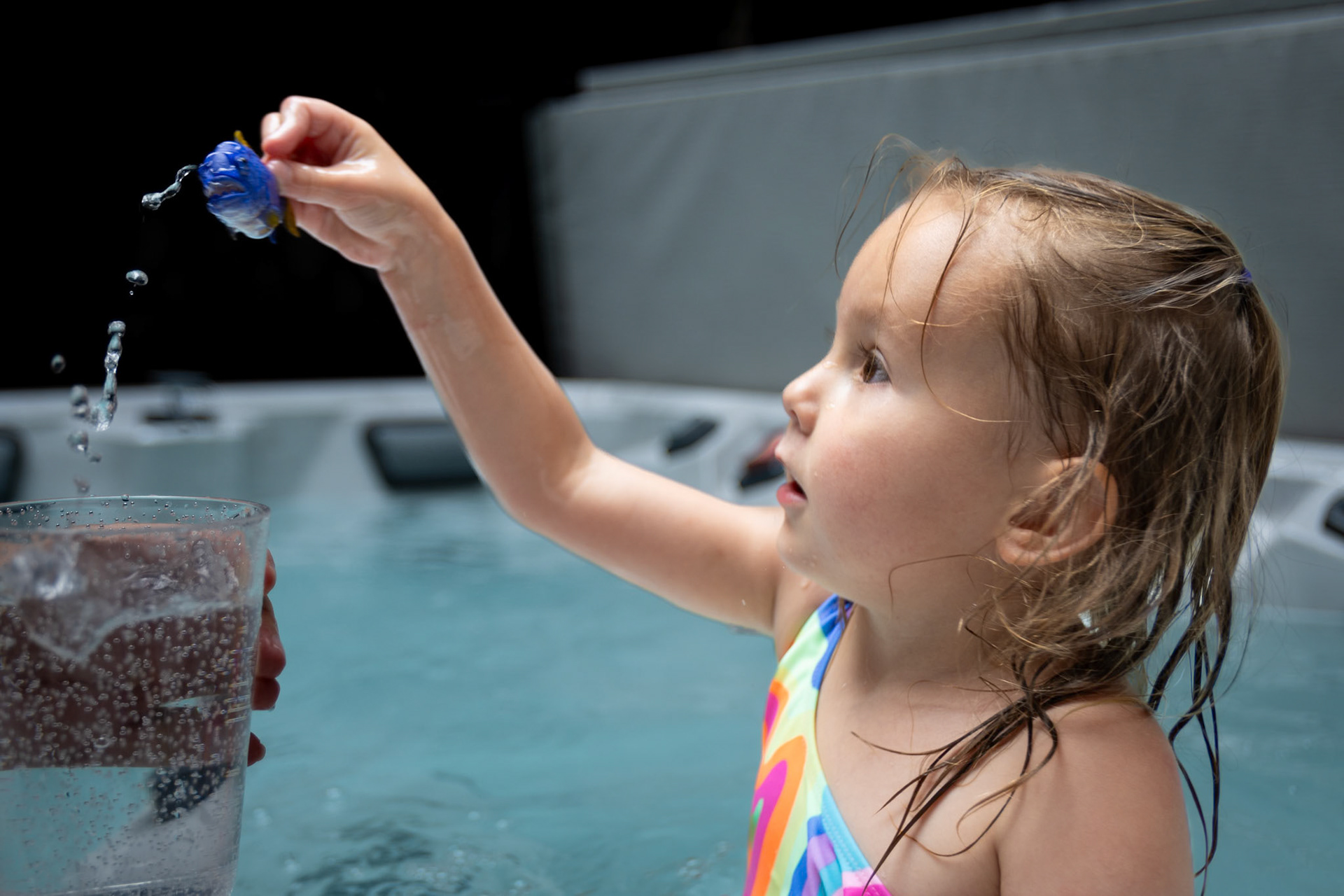 Experimenting with color-changing fish in the hot tub