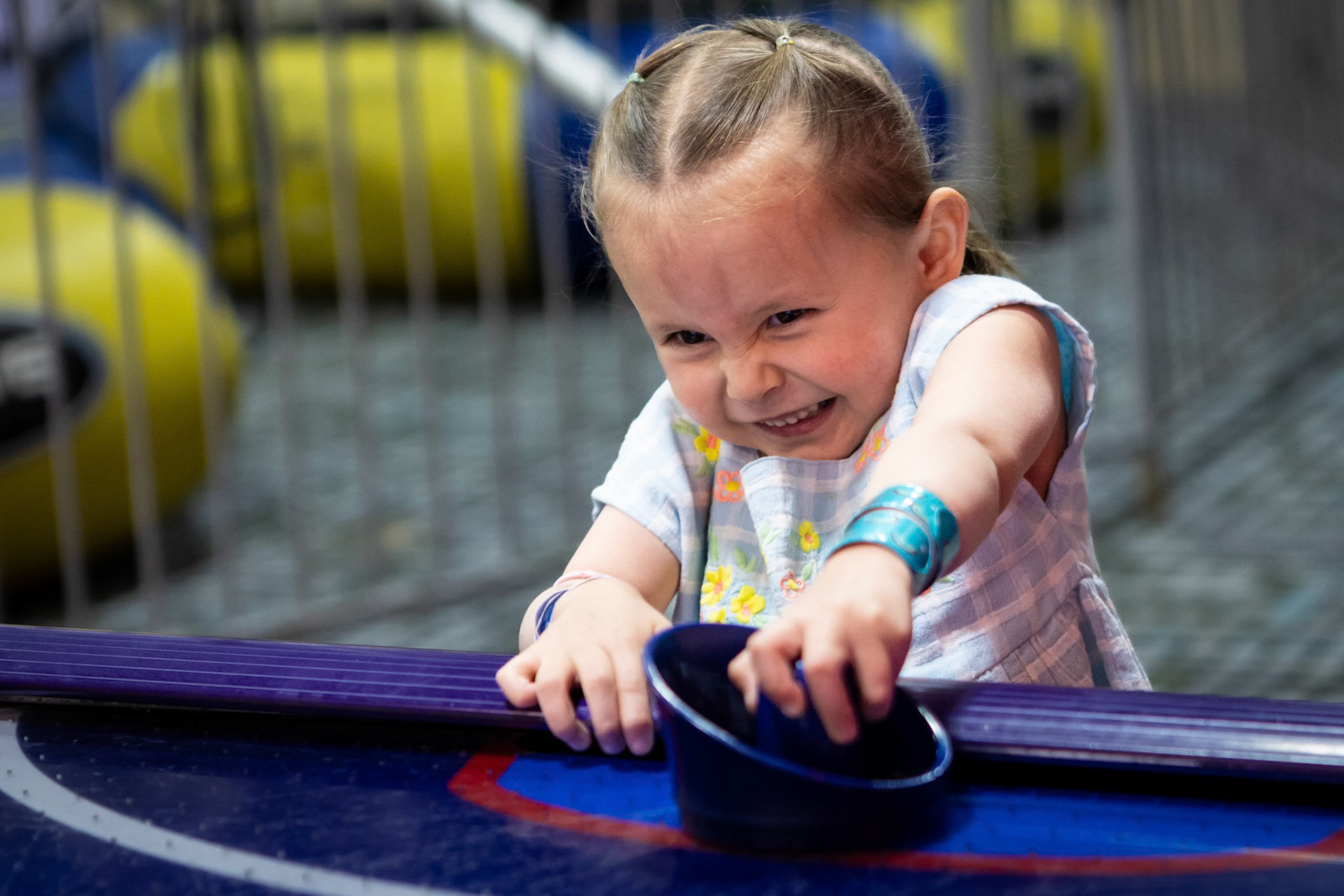 An intense game of air hockey at Family Sports Center