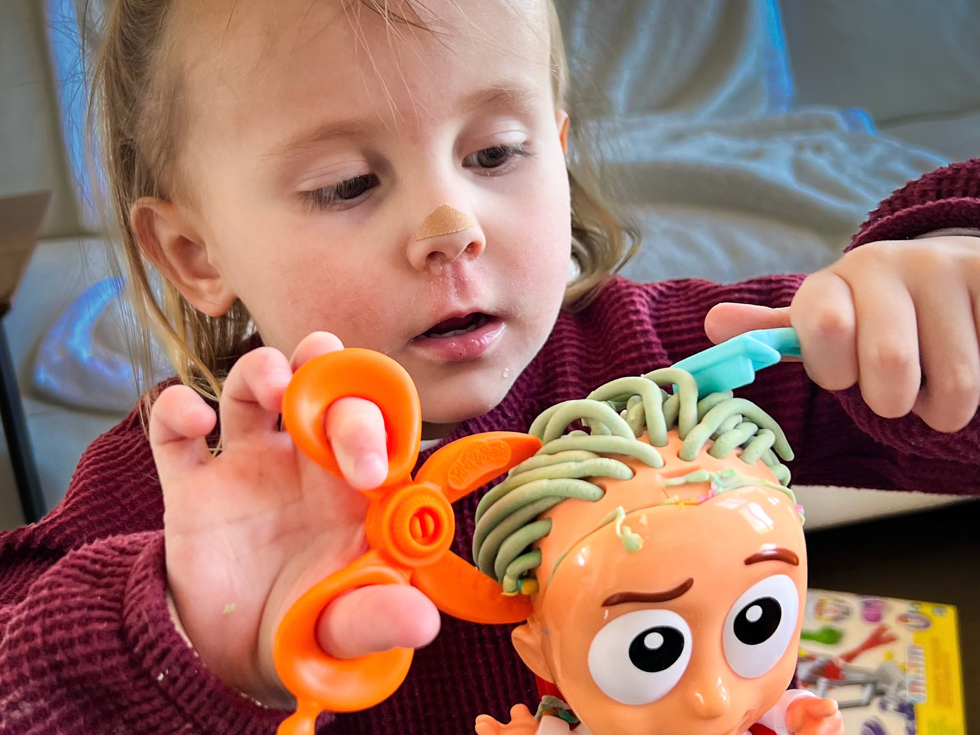 Practicing grooming skills with the Play-Doh Salon