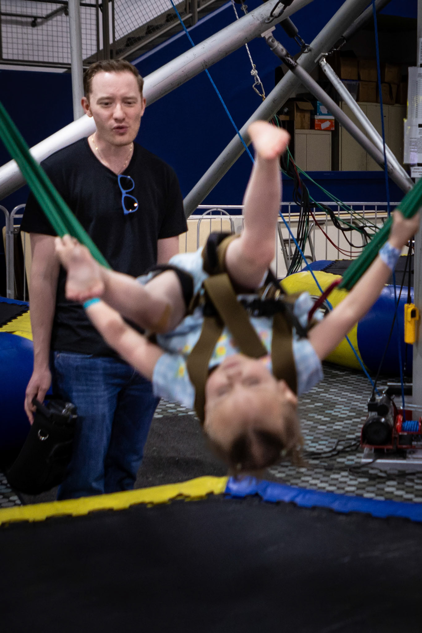 Going full inversion for Uncle E on the bungee trampoline at Family Sports Center