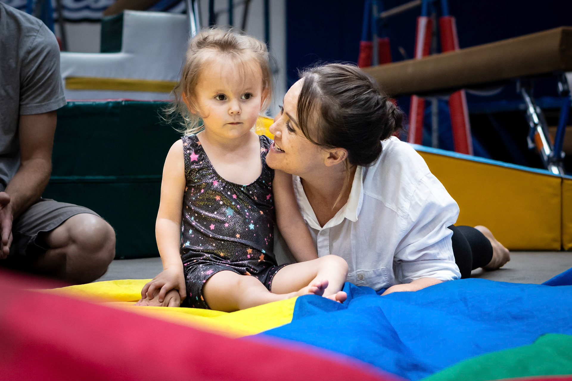 Taking a break with Mom after gymnastics class