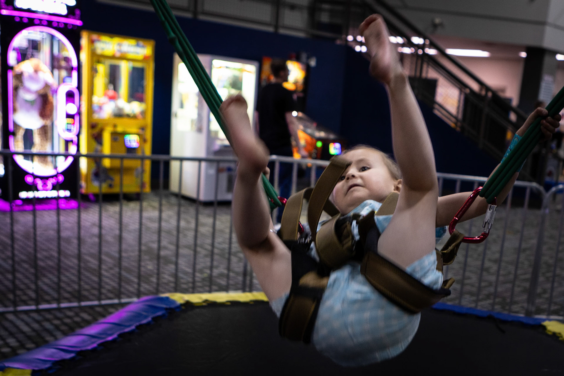 Going full inversion on the bungee trampoline at Family Sports Center