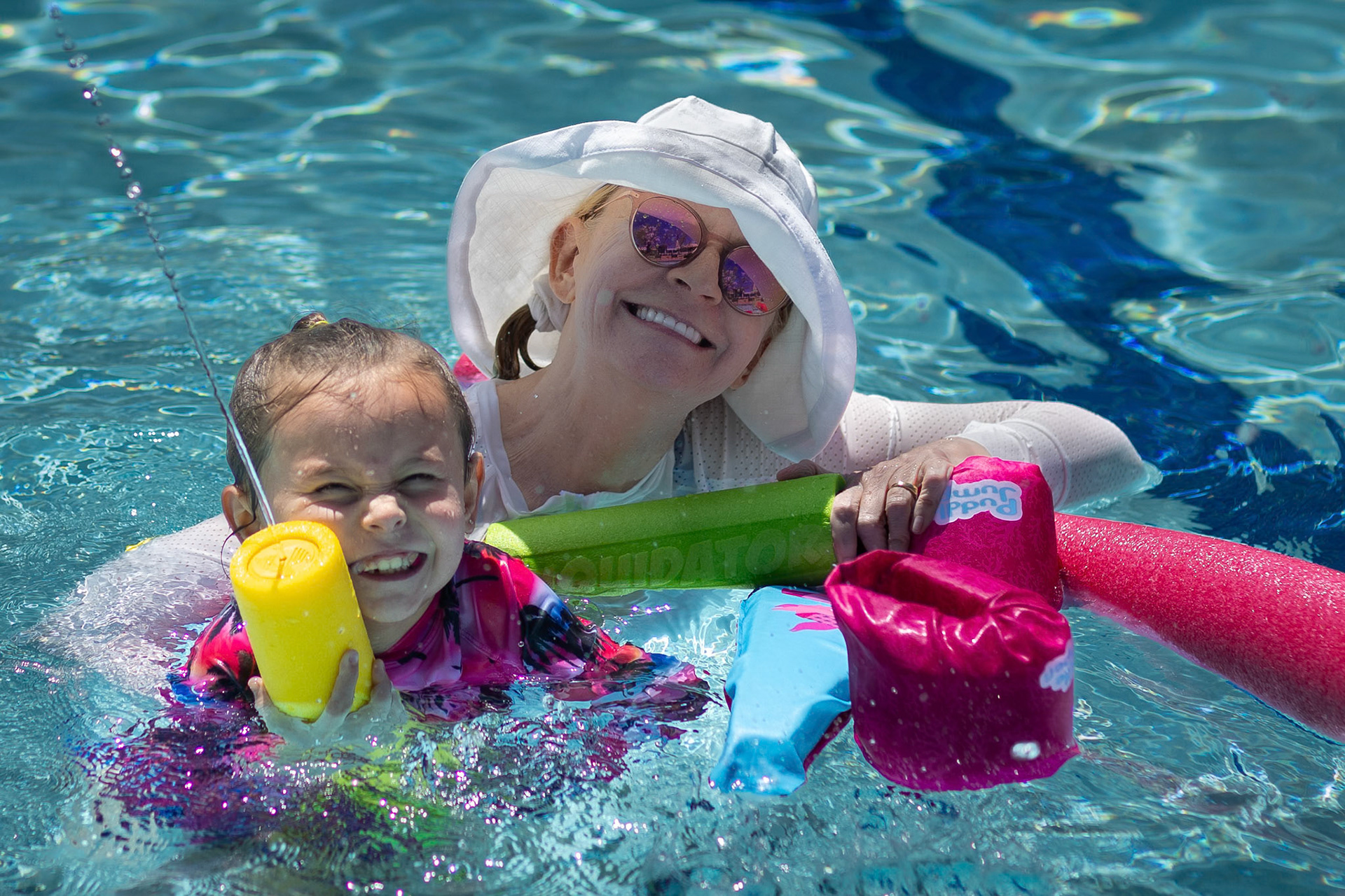 Testing her fire power in the pool with Mimi