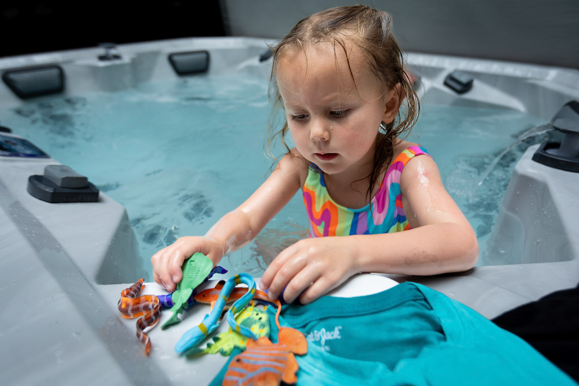 Experimenting with color-changing fish in the hot tub