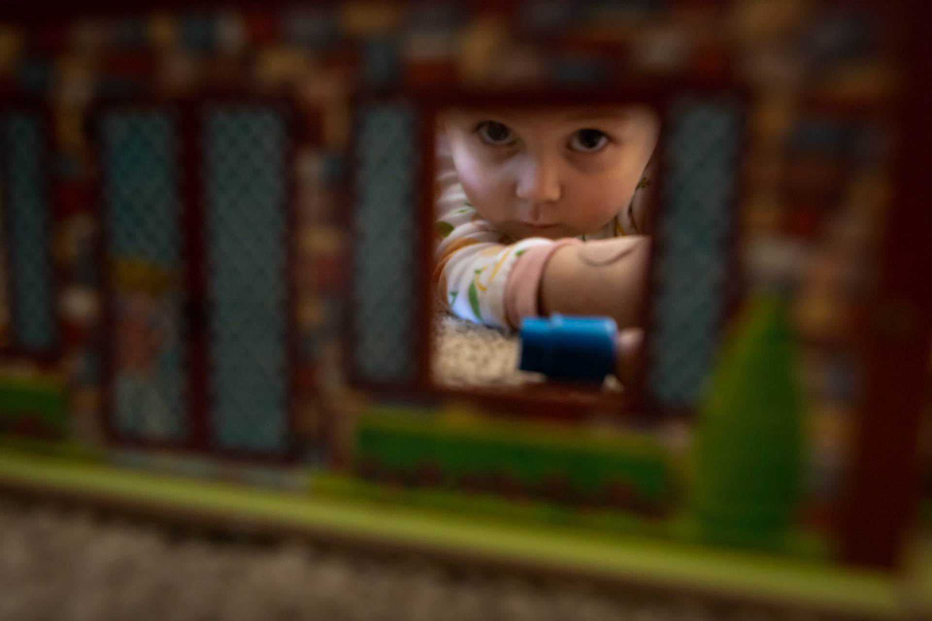 Playing dollhouse with grandma