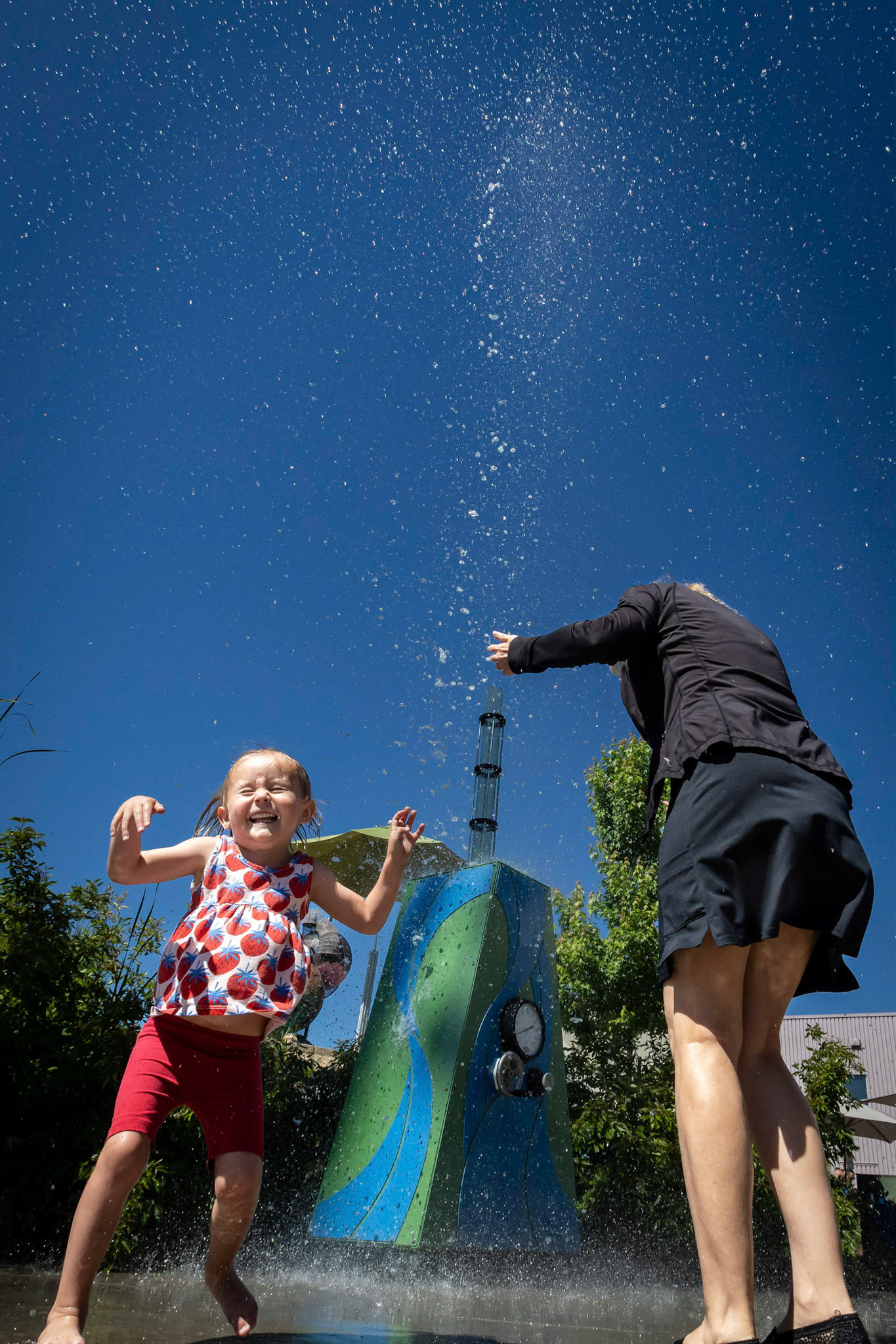 Enjoying the water cannon at Children's Museum with Me-Me