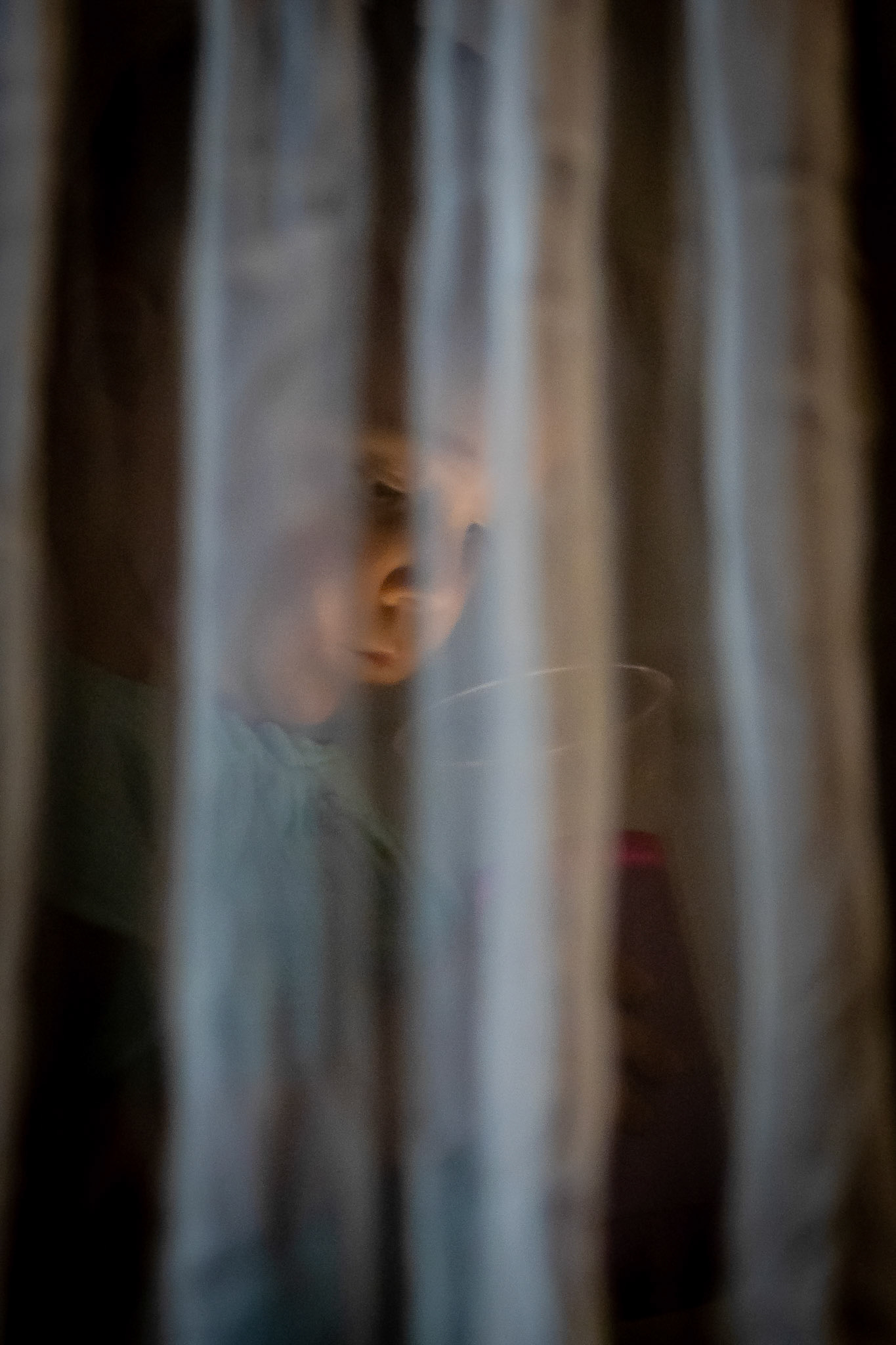 Studying the wonders of light in the privacy of a basement fort