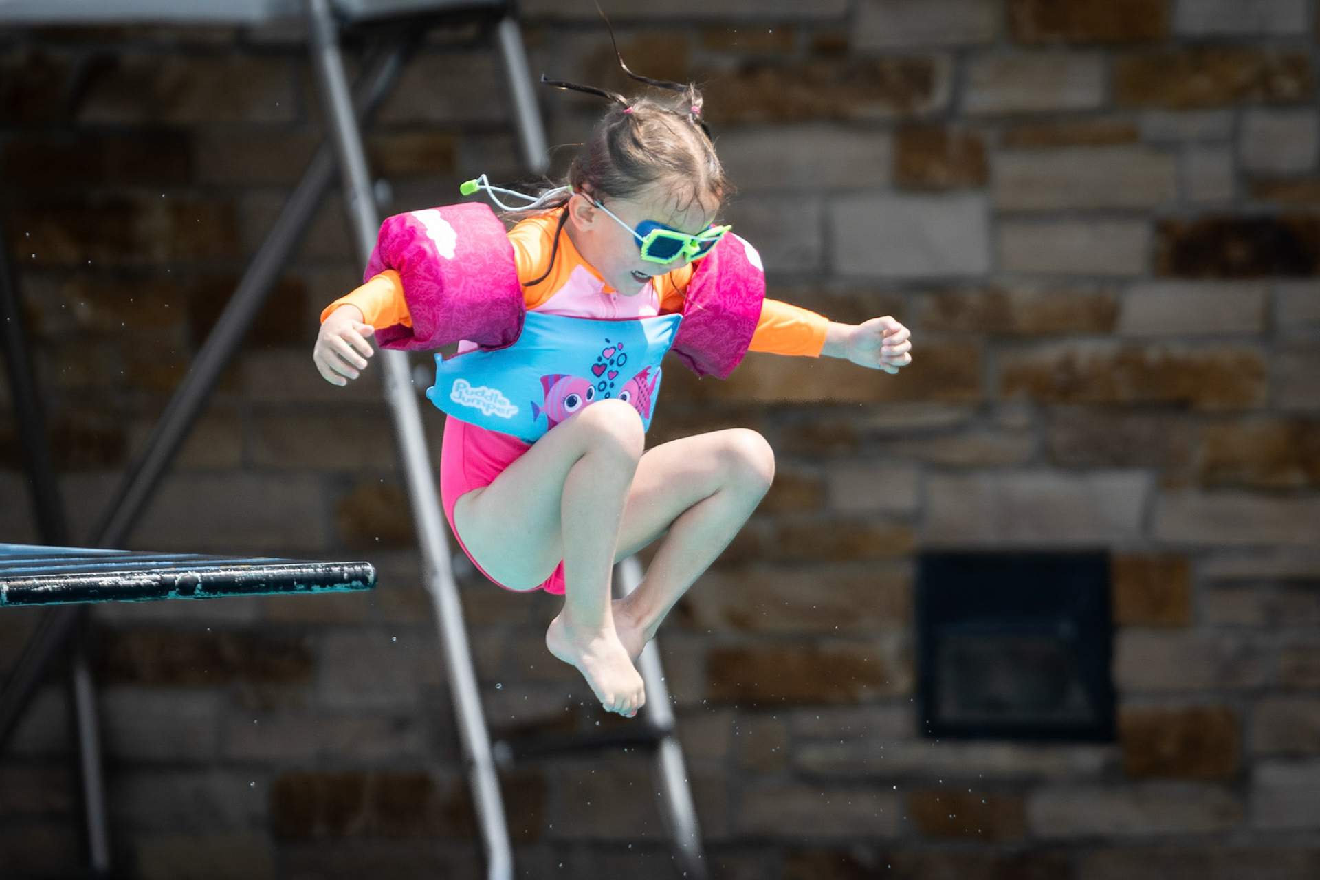 Taking a plunge off of the diving board