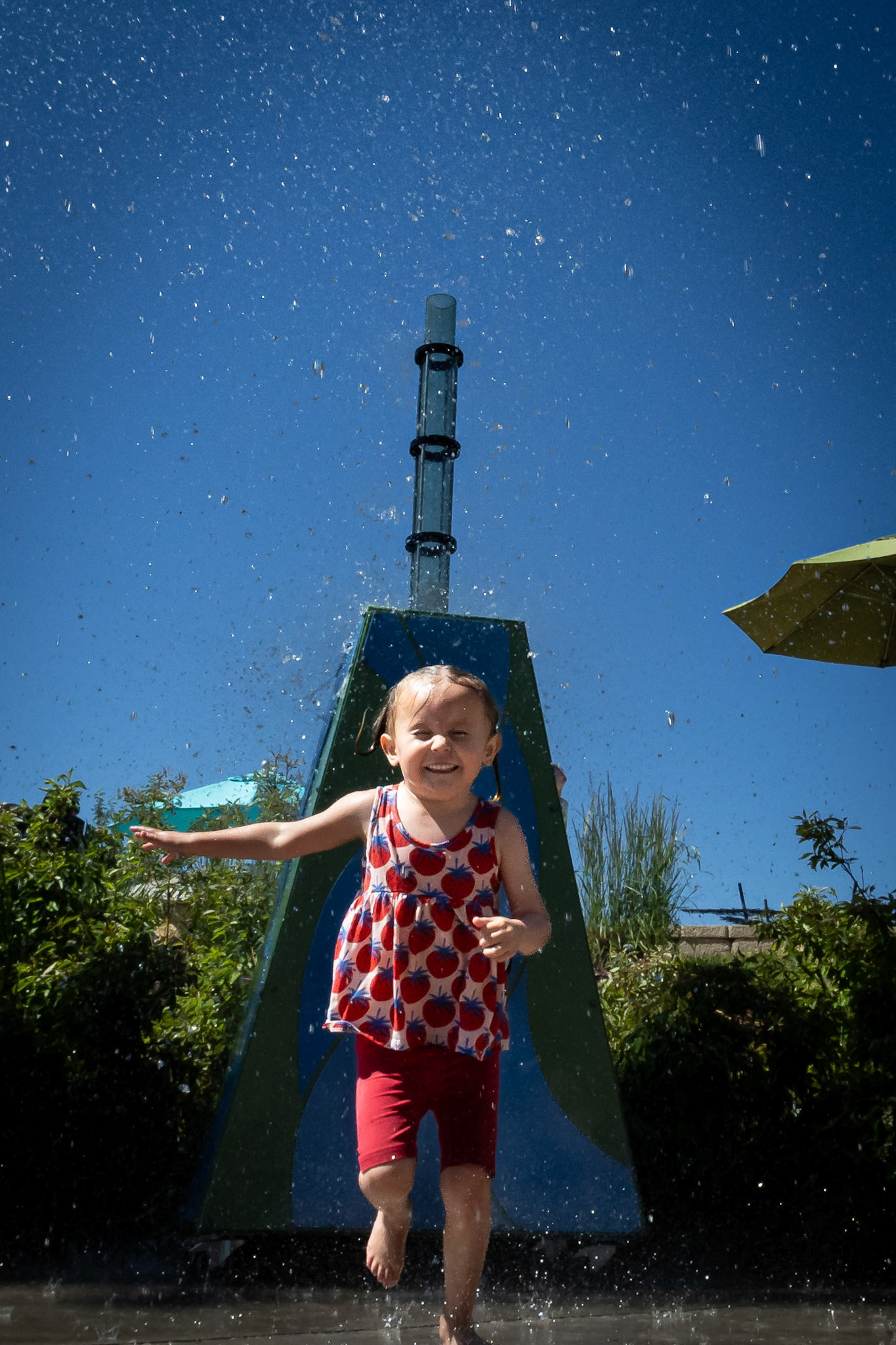 Outrunning, or trying to, the water cannon at Children's Museum