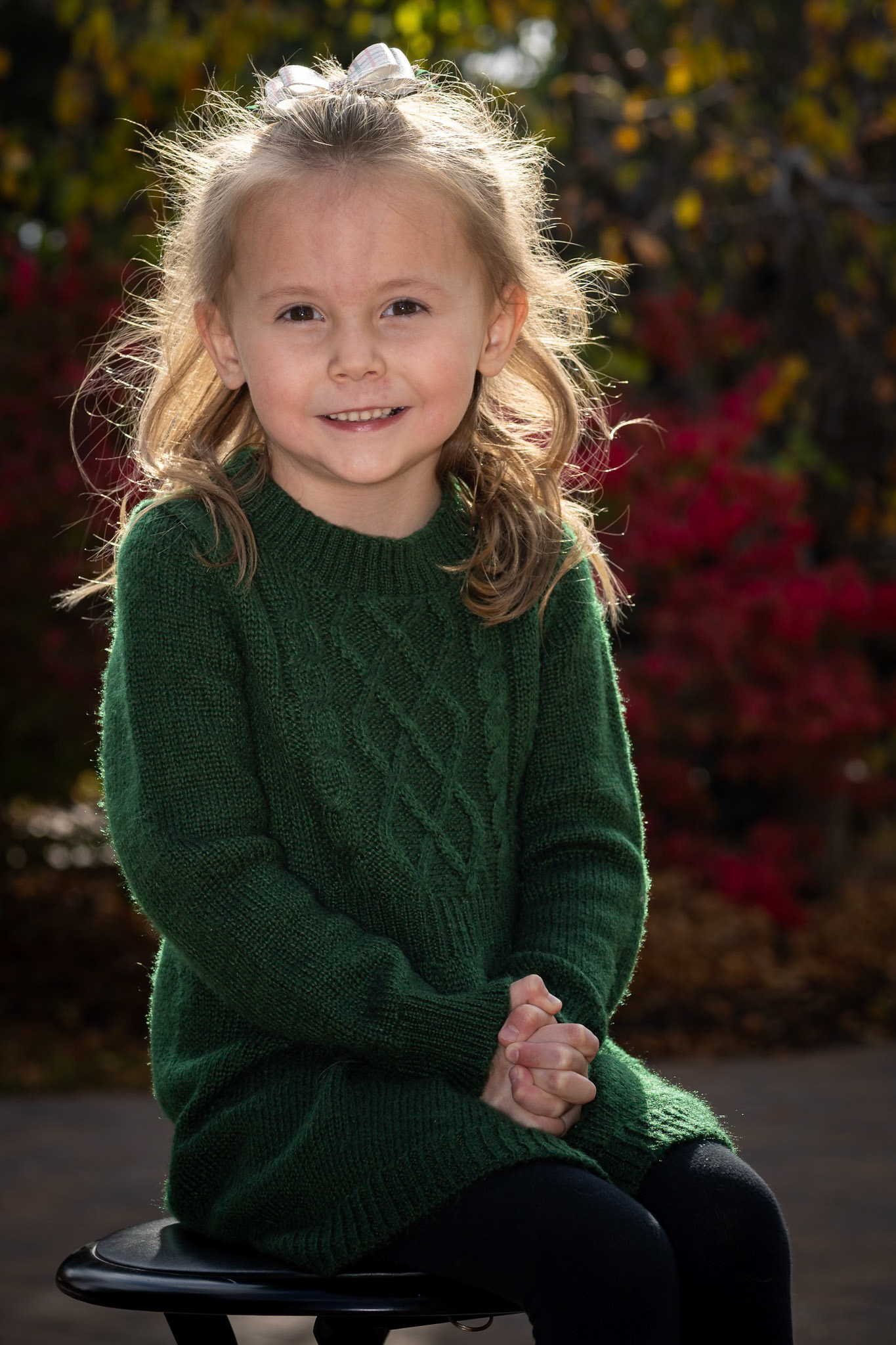 Sitting for a class portrait on a warm autumn afternoon