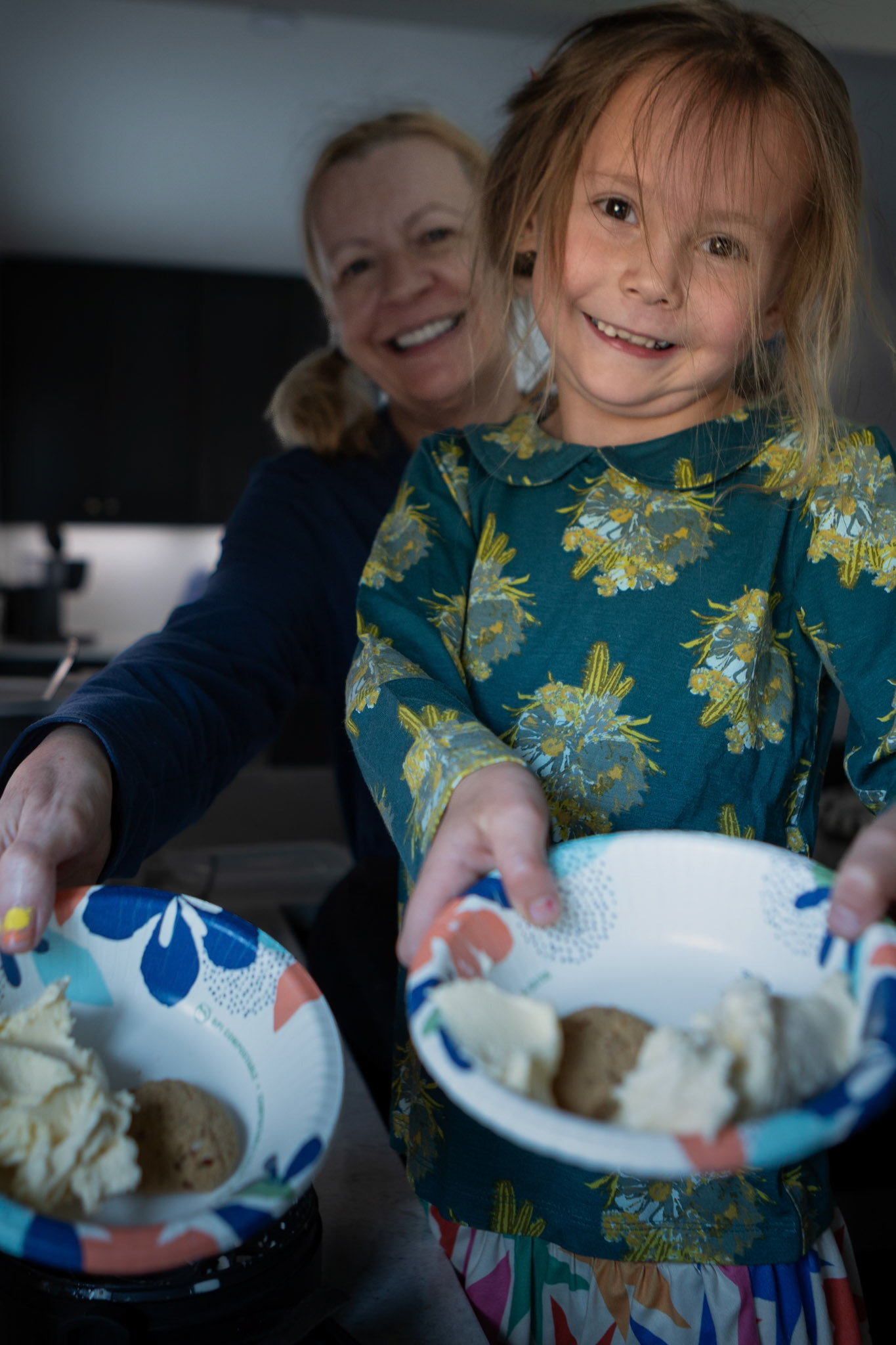 Serving up a snack of dellicious hojmemade ice cream and cookies