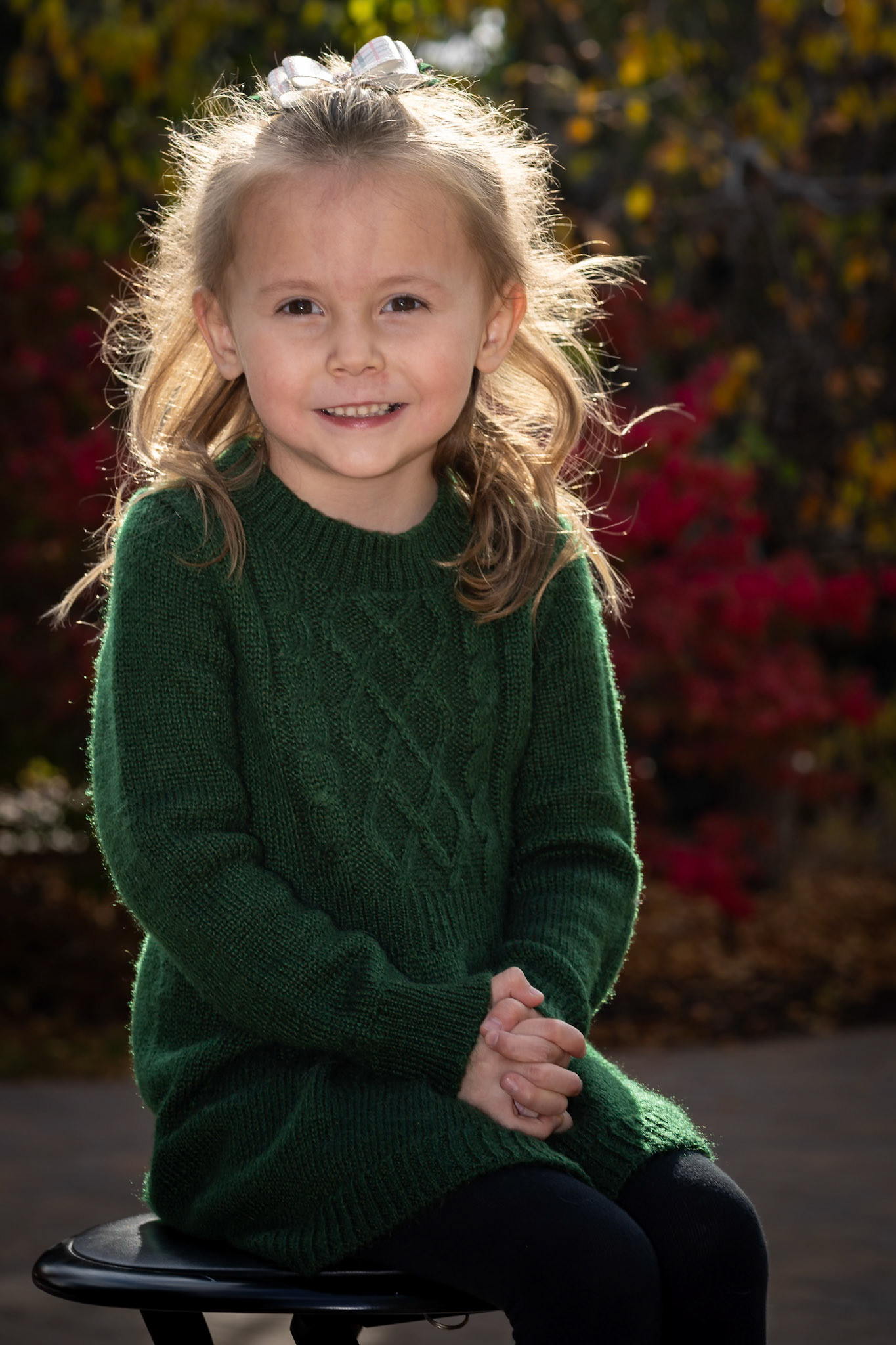 Sitting for a class portrait on a warm autumn afternoon