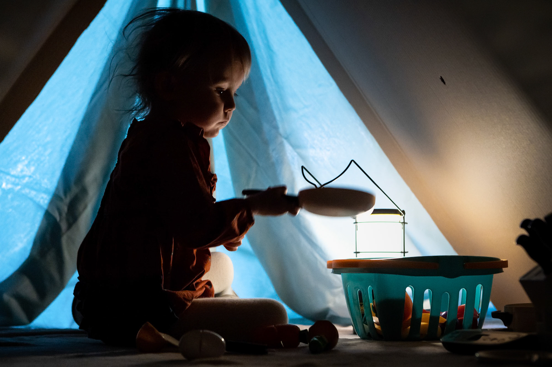 A quiet snack in a makeshift fort