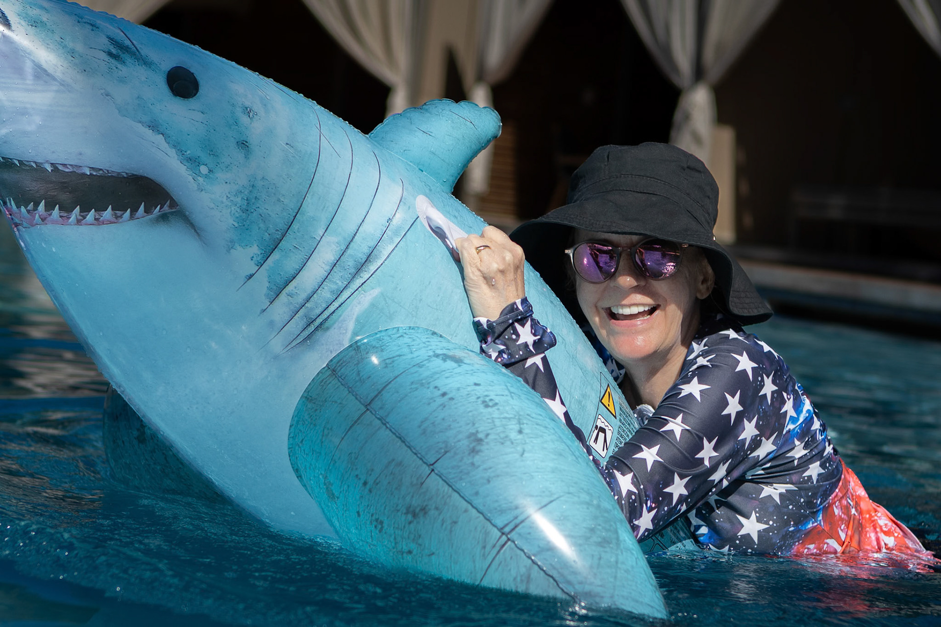Shark taming in the Grand Wailea swimming pool