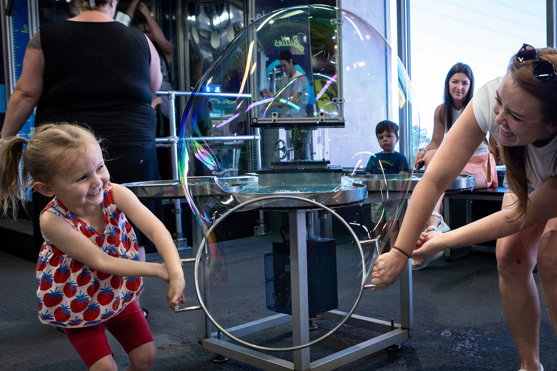 Bubble making with Mom  at the Children's Museum