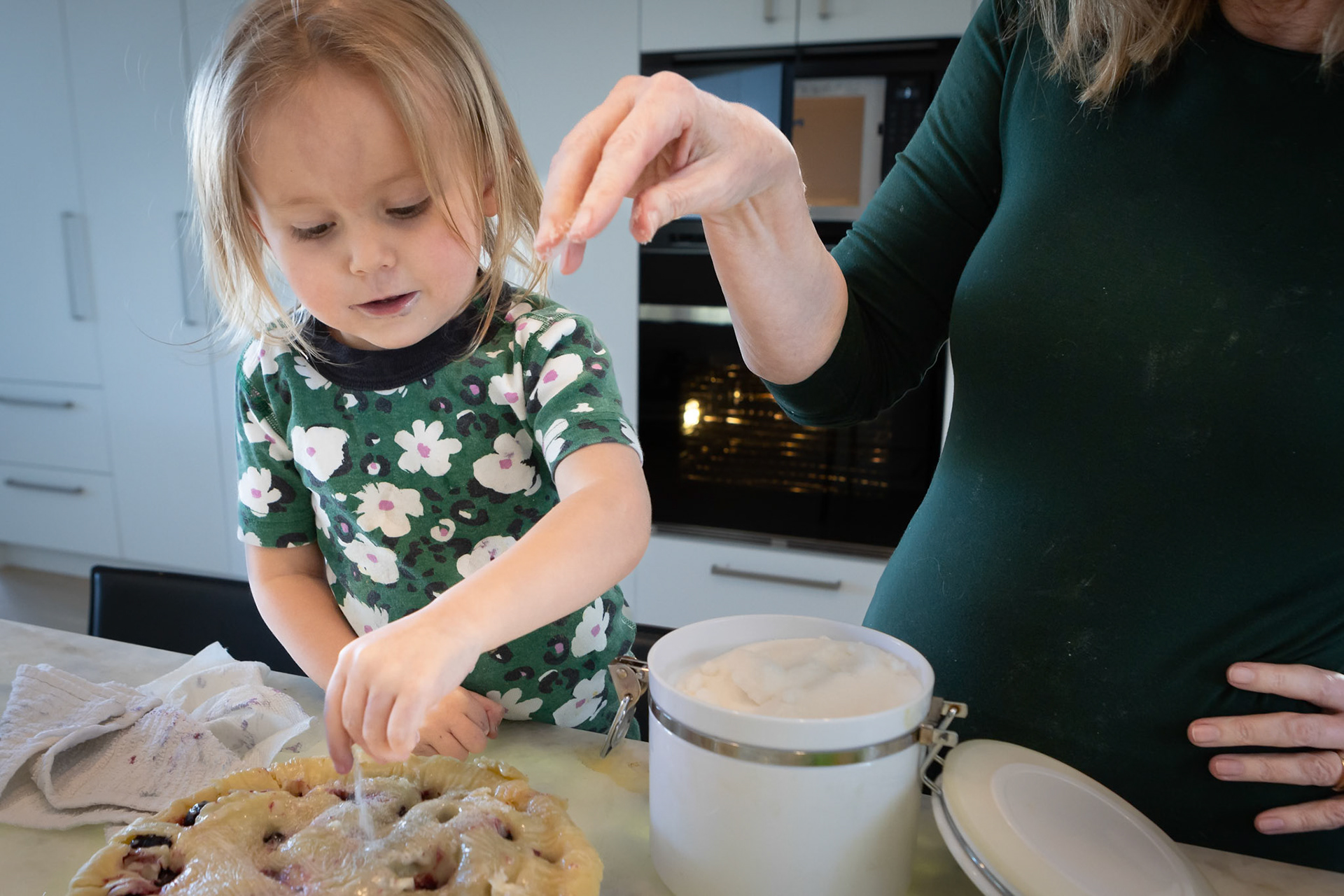 Topping blueberry pie with Mimi's secret ingredient before putting in the oven