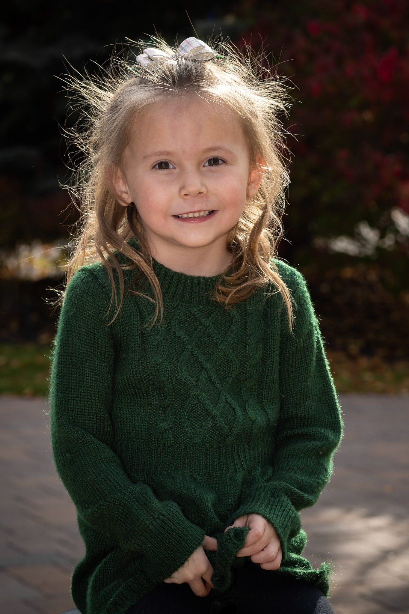 Sitting for a class portrait on a warm autumn afternoon