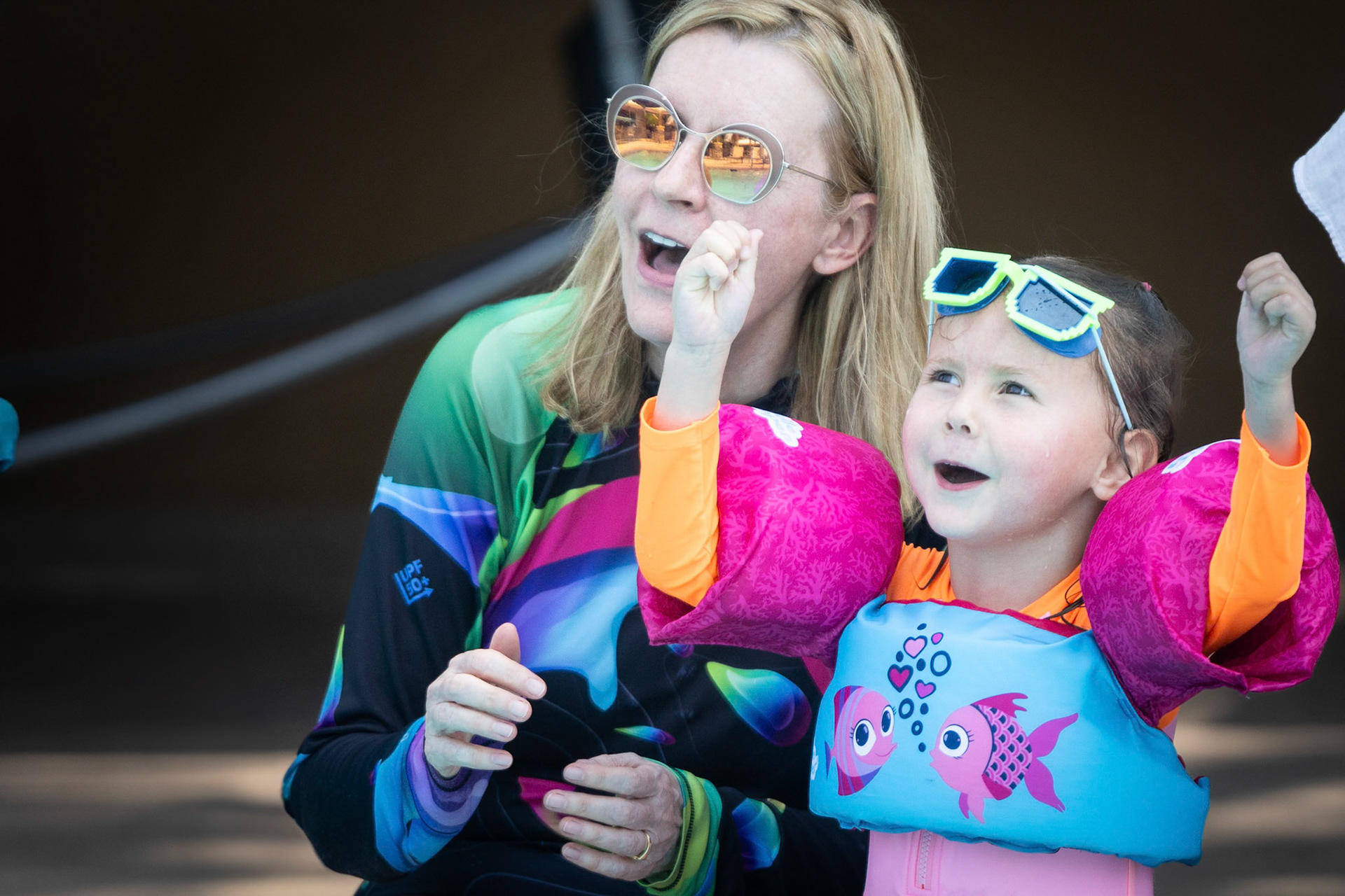 Cheering Dad on as he attempts a backflip off the diving board