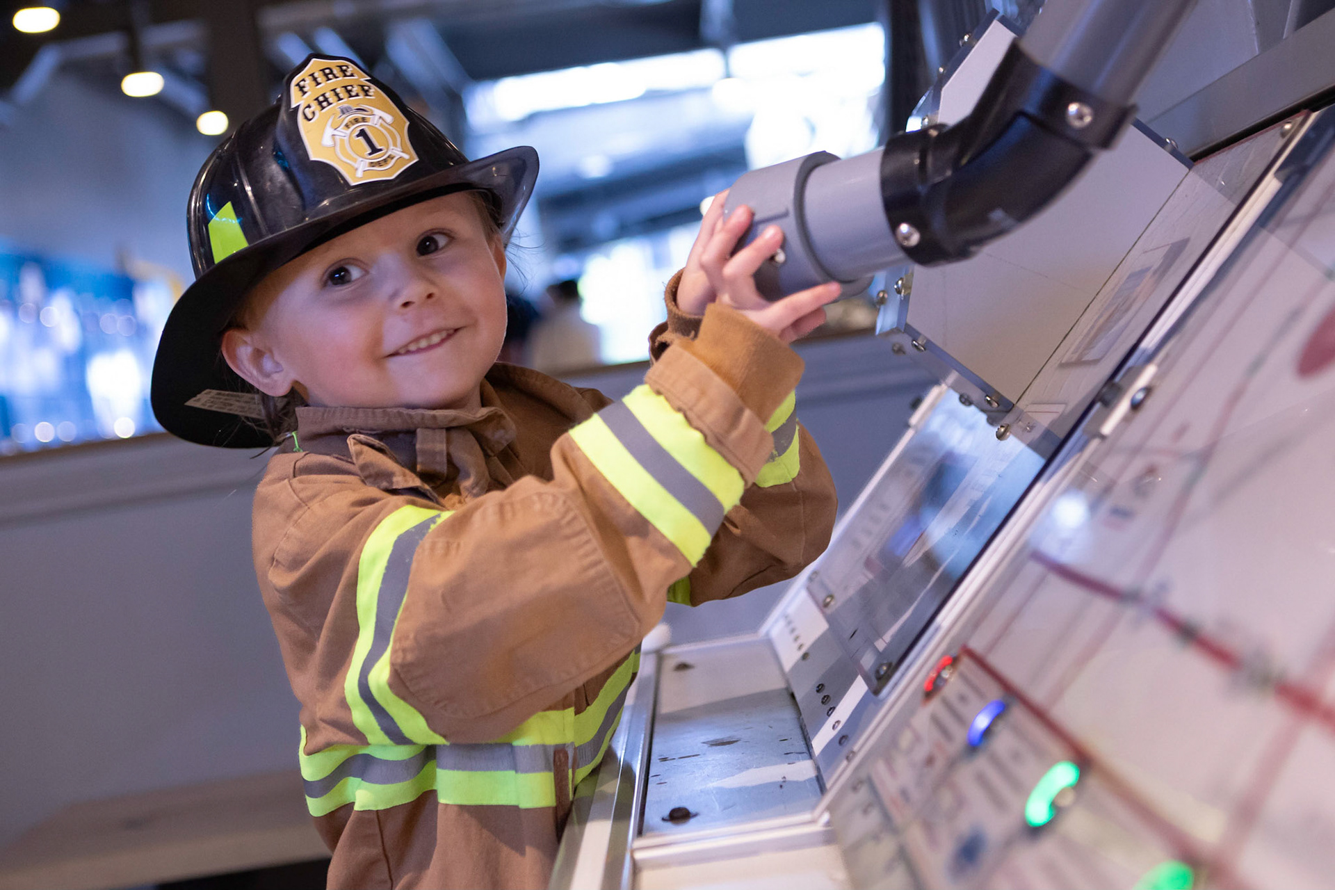 Exploring the fire station at the Children's Museum