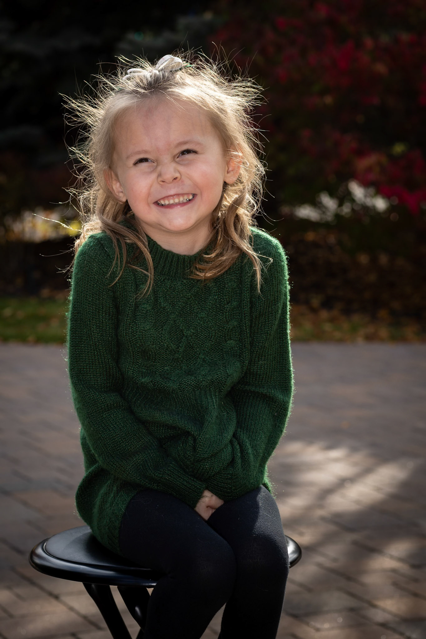 Sitting for a class portrait on a warm autumn afternoon