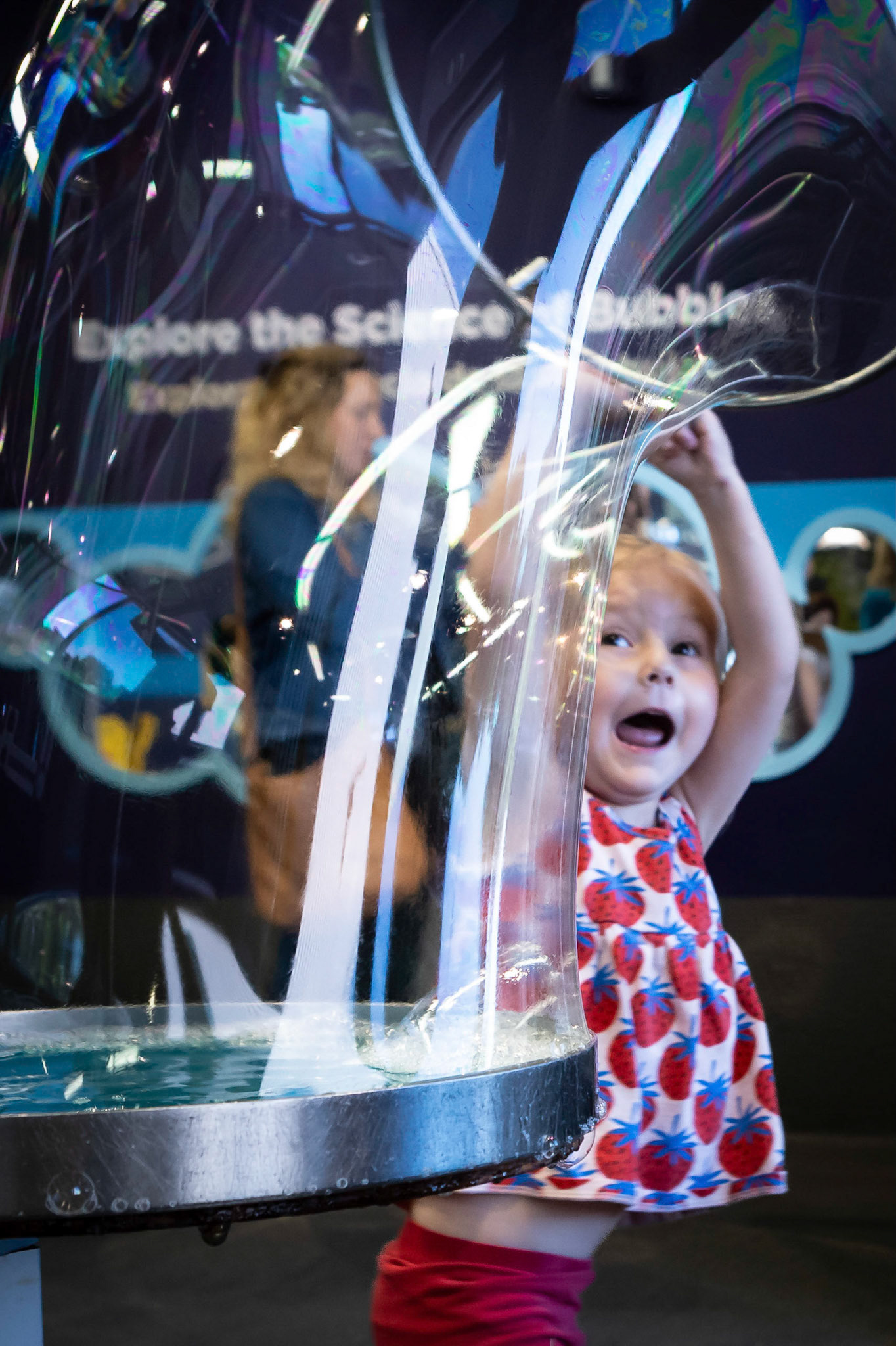 Experimenting with bubbles  at the Children's Museum