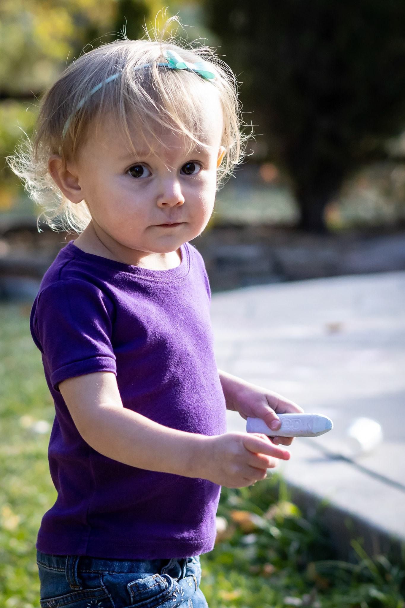 Playing with sidewalk chalk on a warm autumn afternoon.