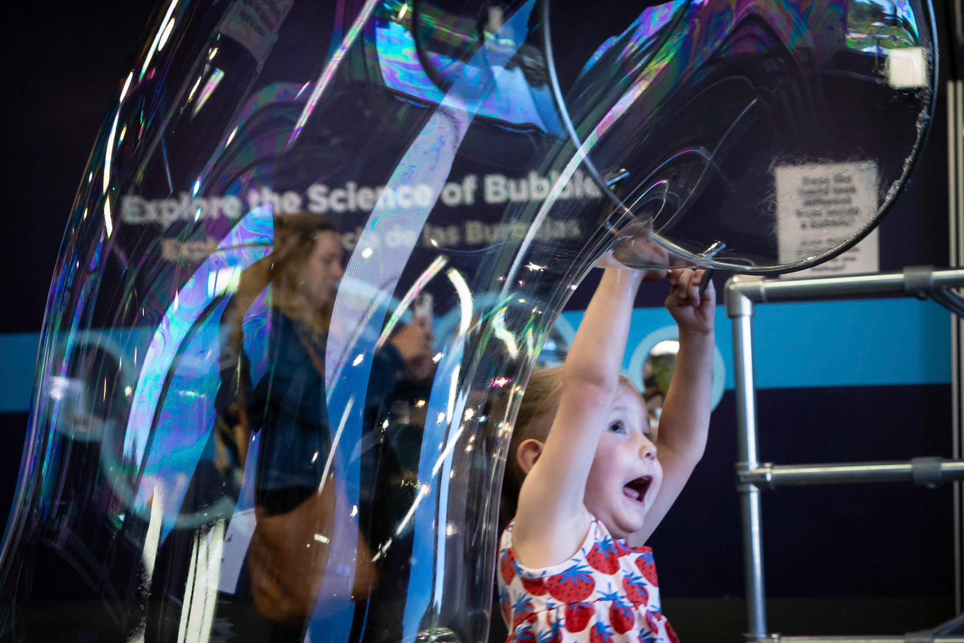 Experimenting with bubbles  at the Children's Museum