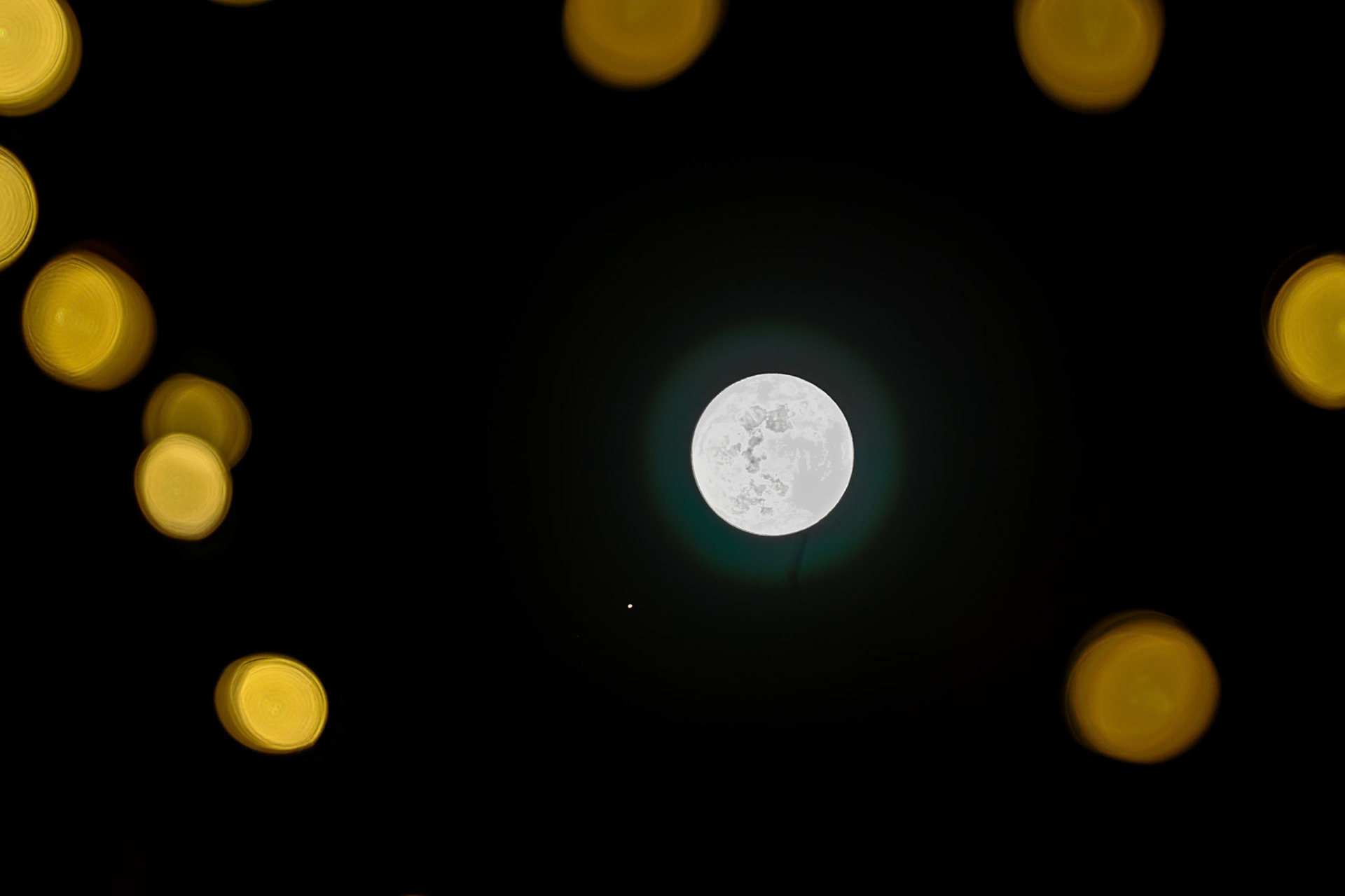 Holiday lights are upstaged by a lunar occultation of Mars