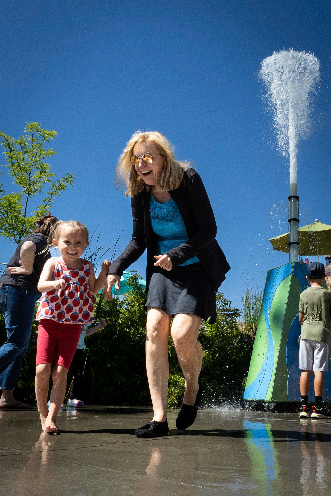 Enjoying the water cannon at Children's Museum with Me-Me