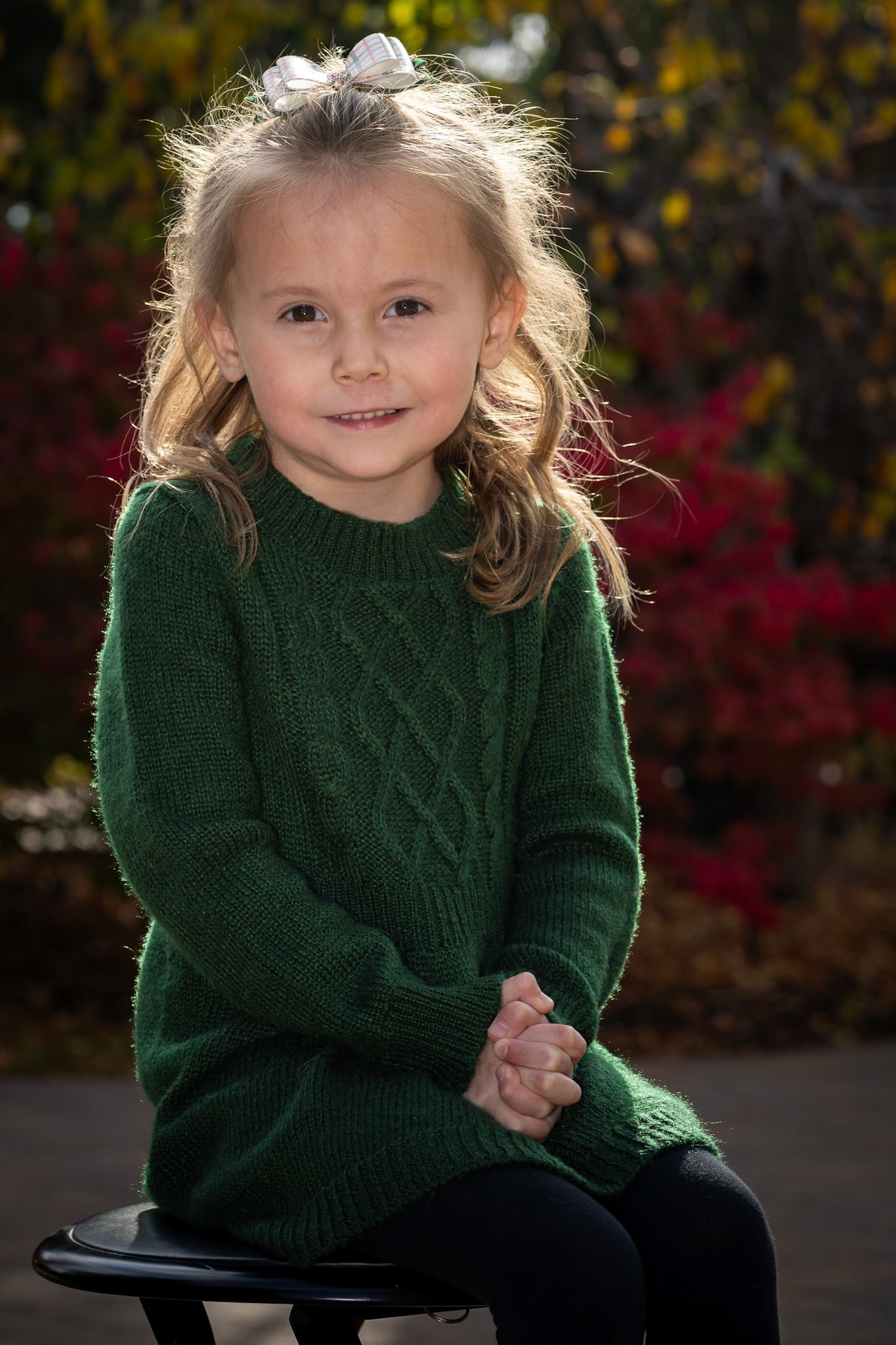 Sitting for a class portrait on a warm autumn afternoon