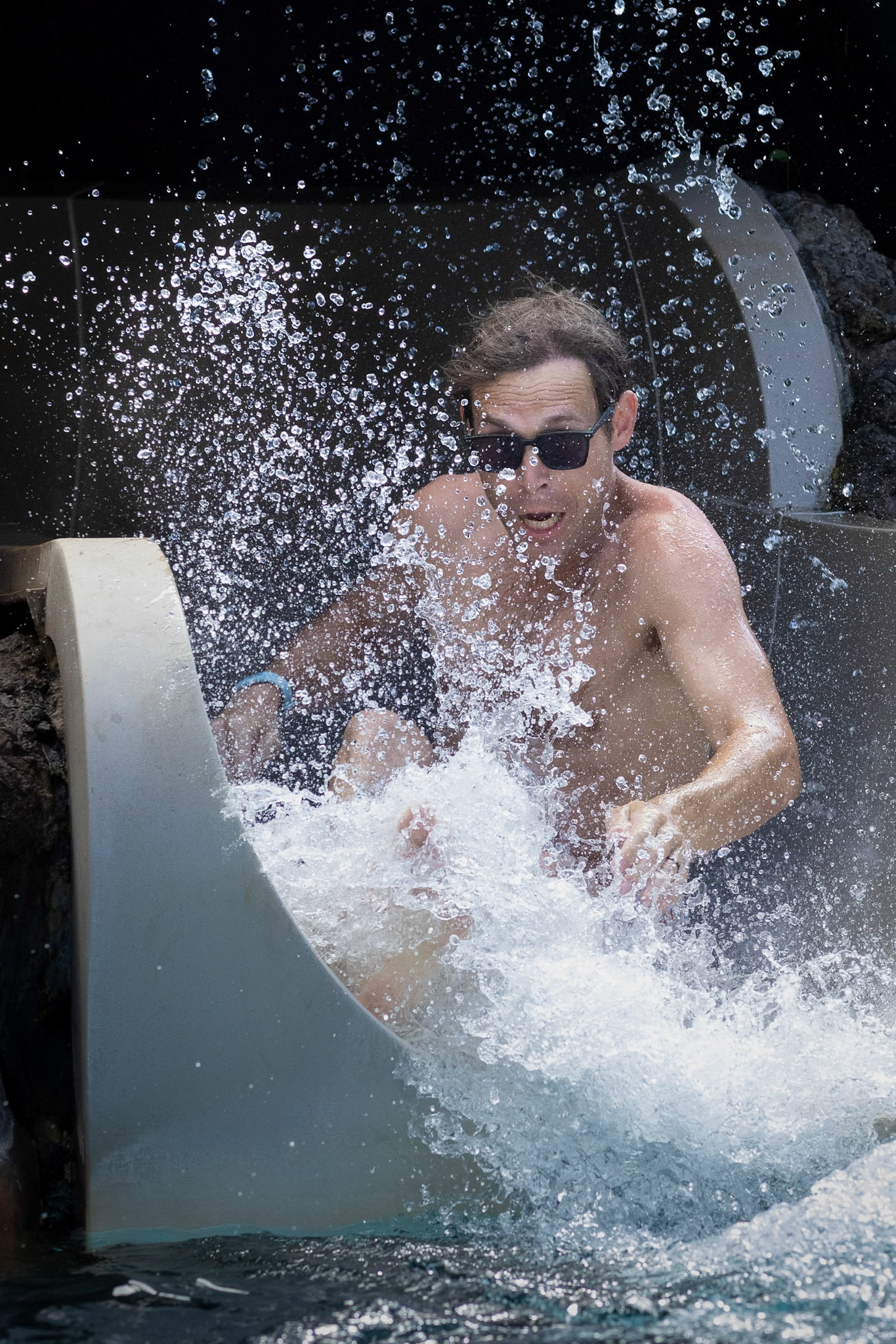 Dad takes a plunge down the aptly named Puka slide at Grand Wailea