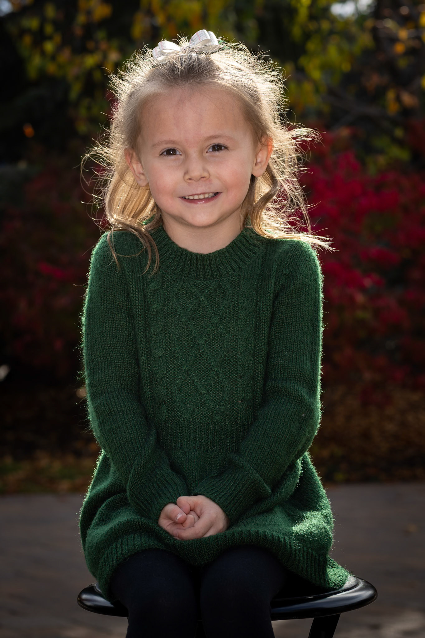 Sitting for a class portrait on a warm autumn afternoon