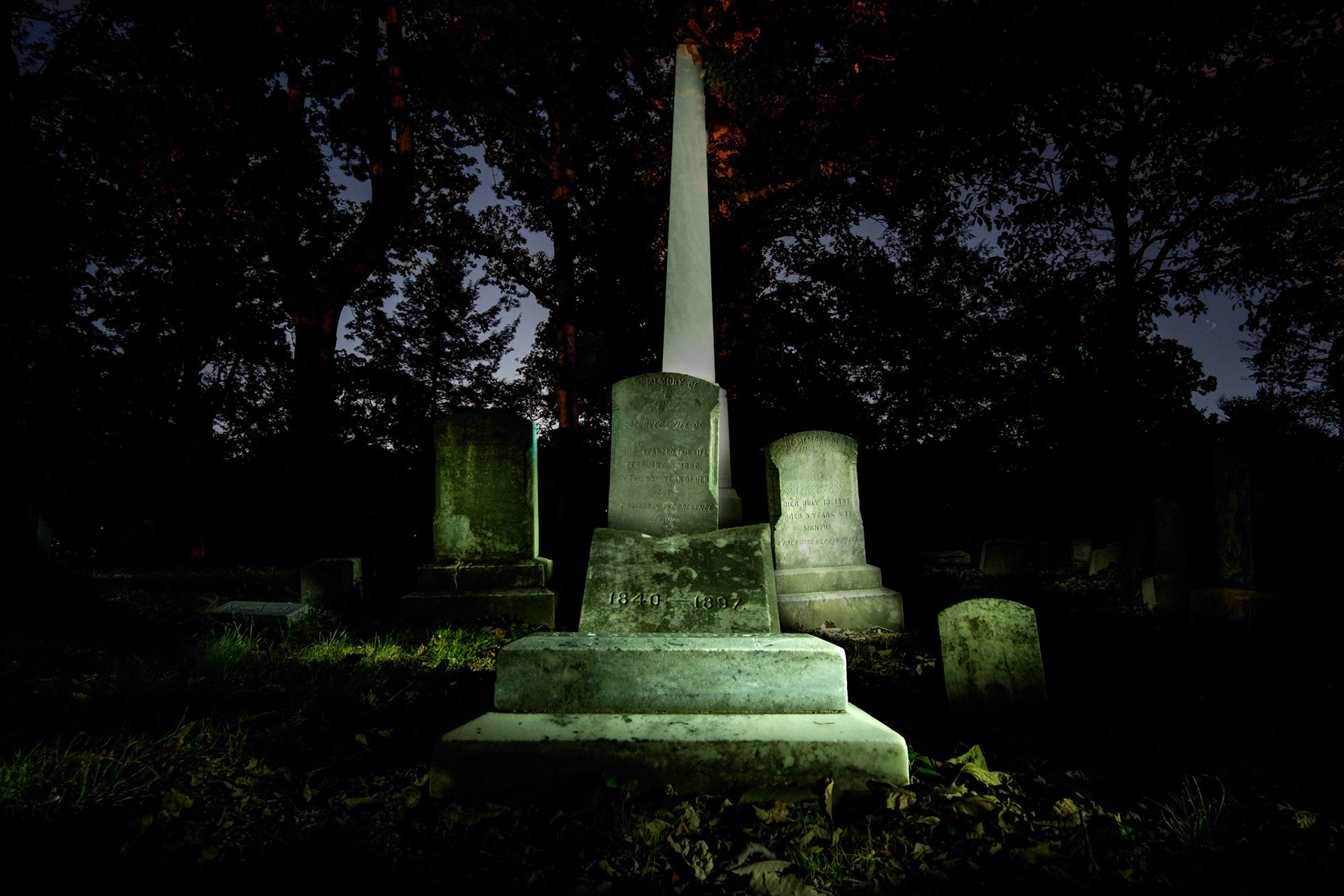 Names digitally removed at the request of the cemetery out of respect to the family.