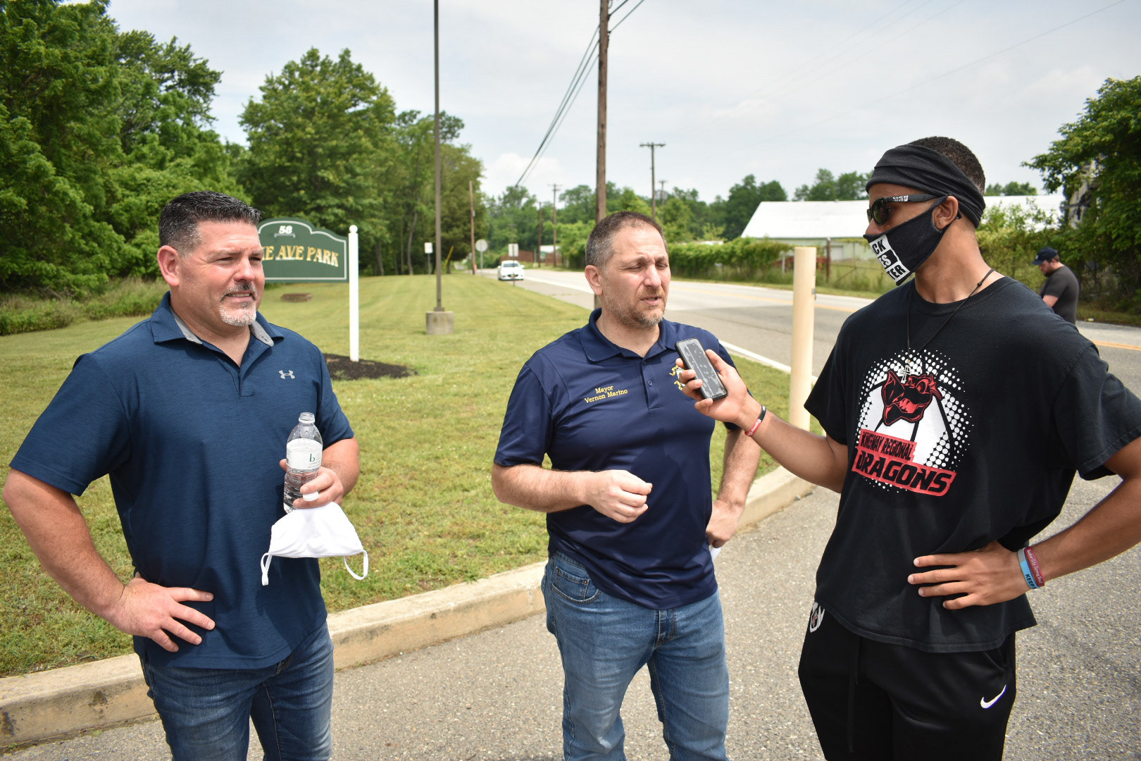 student journalist Cameron Martin with local mayor talking about his view on Black lives Matter