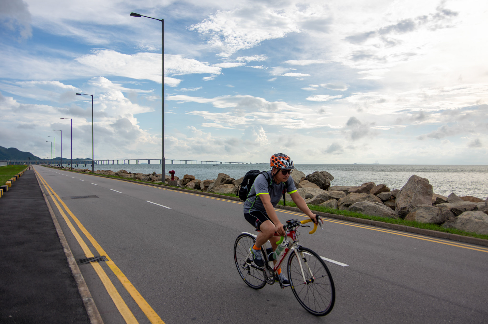 Cyclist by the Seaside