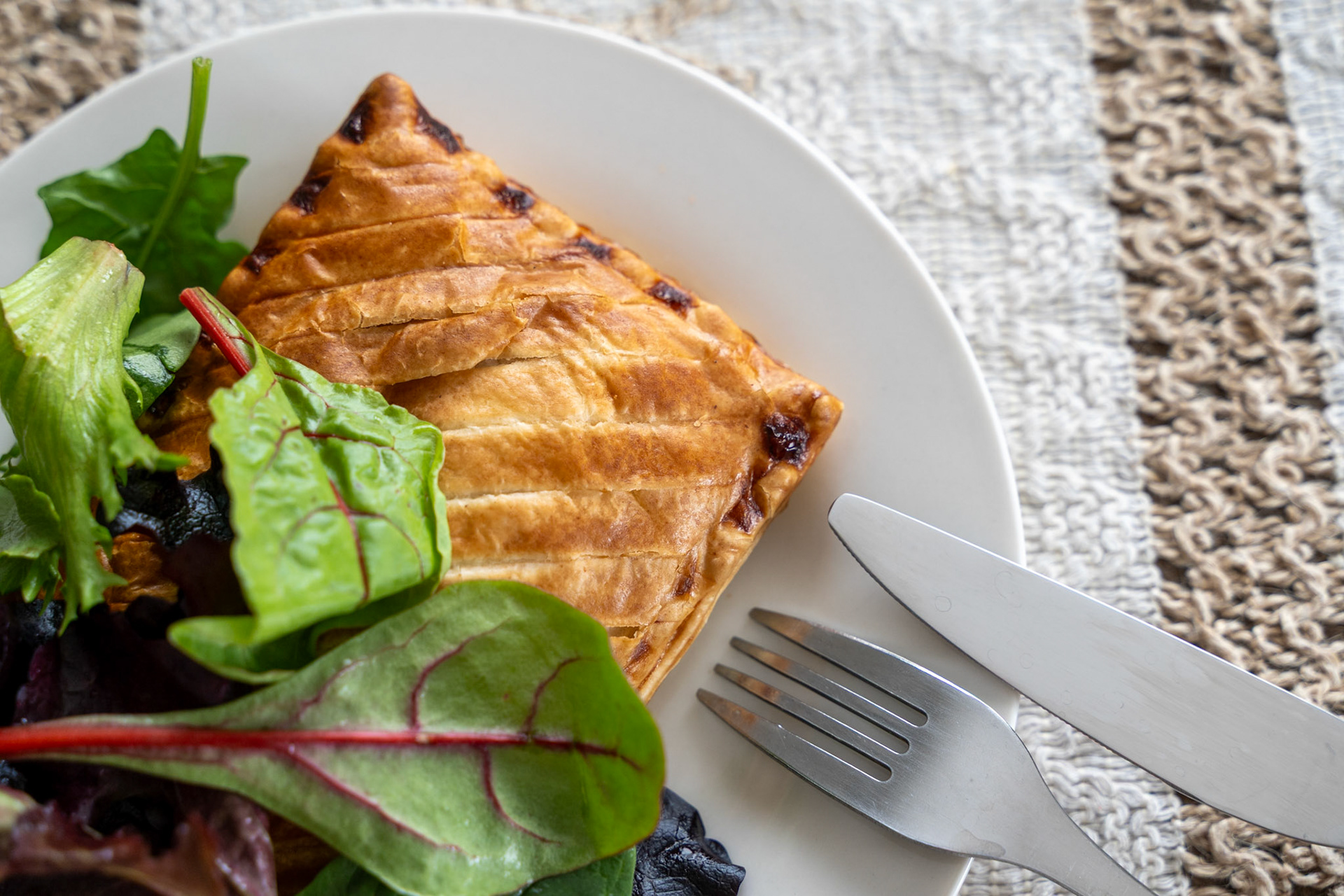 Pastry with Salad on White Plate