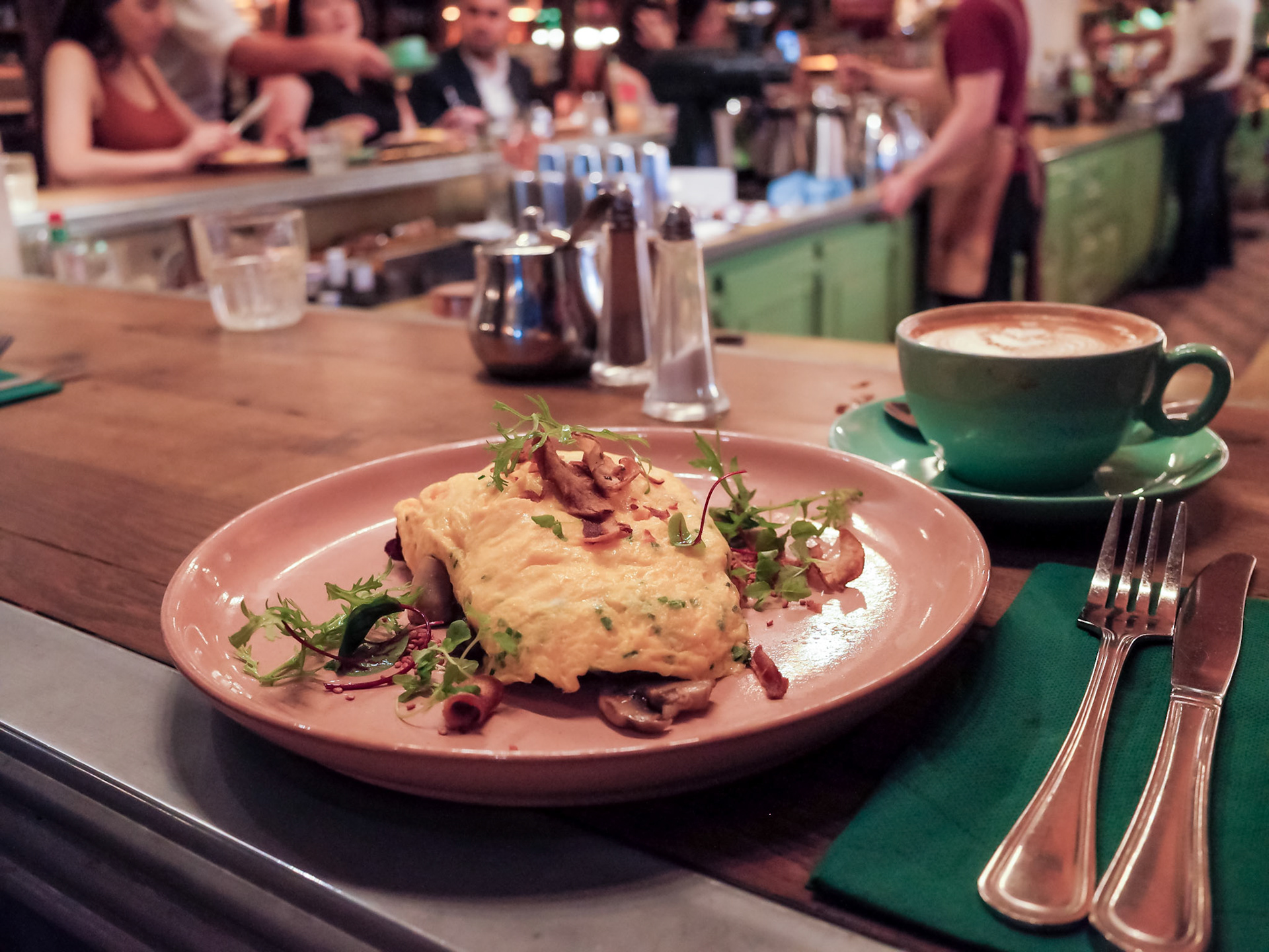 Cafe brunch with omelette and cappuccino