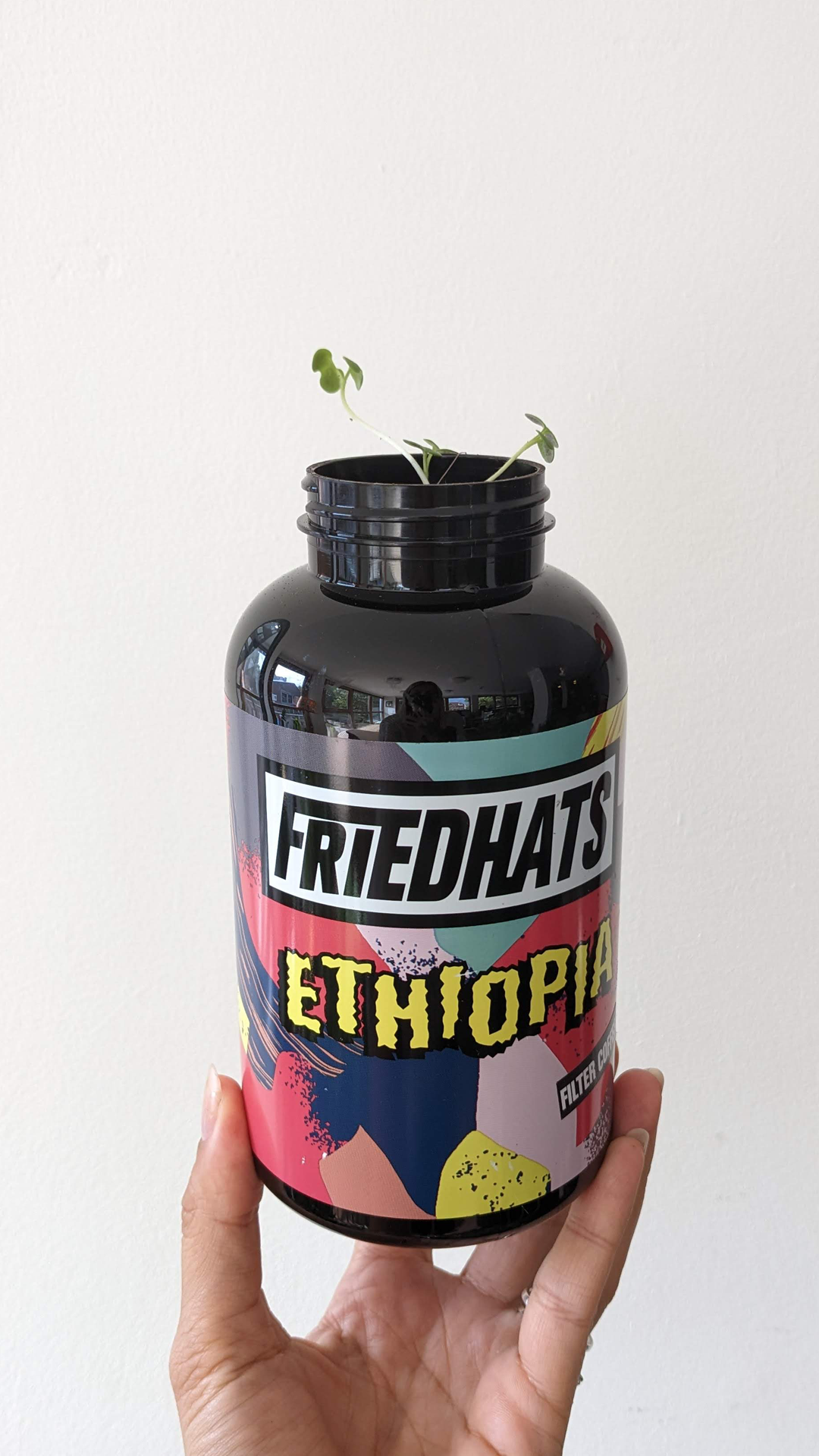 Friedhats Ethiopia coffee bottle • Flower seed bomb • "This really cool packaging is from a coffee roaster in Amsterdam Bos en Lommer called Friedhats FUKU. They use vitamin bottles for their coffee beans. Their small cafe can easily be missed, but the coffee is great! They even have a little garden where you can sit."
