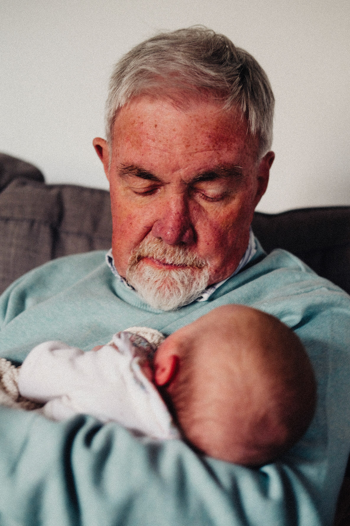 Man holding a baby