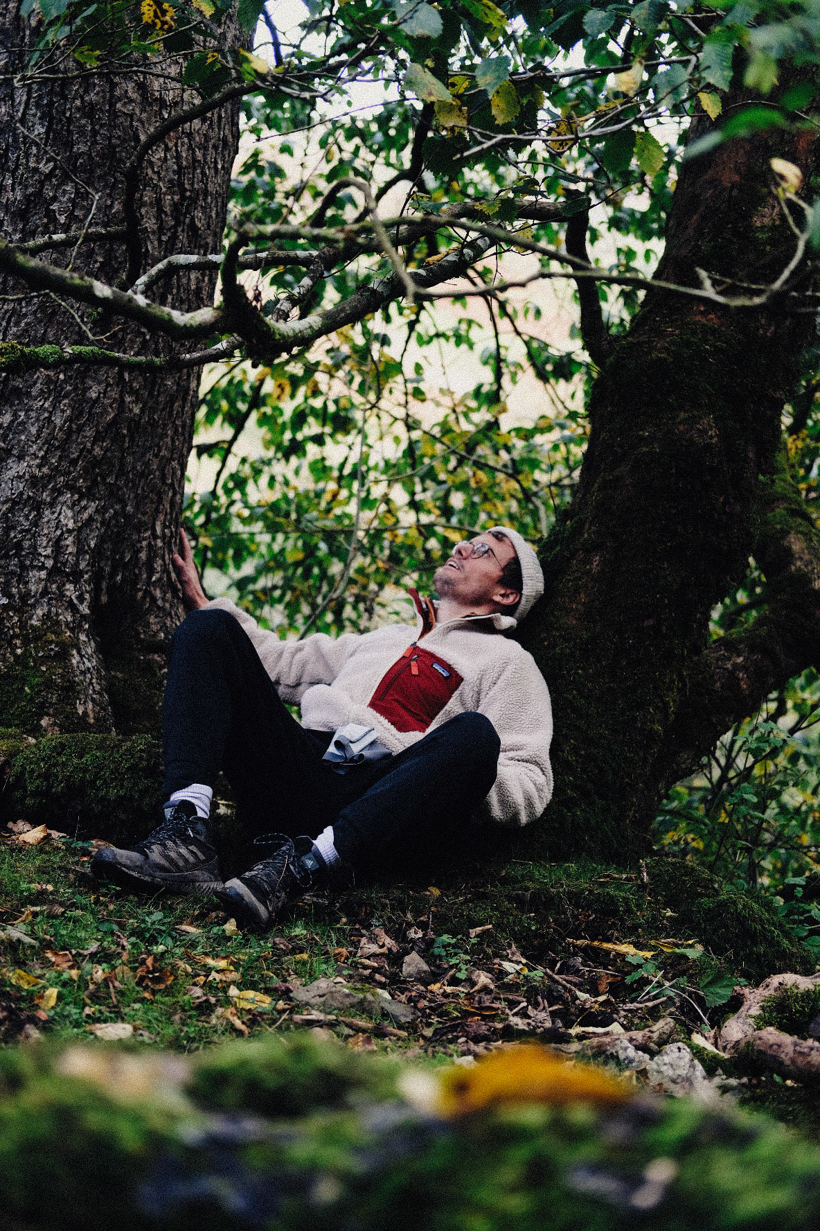 Man relaxing under a tree