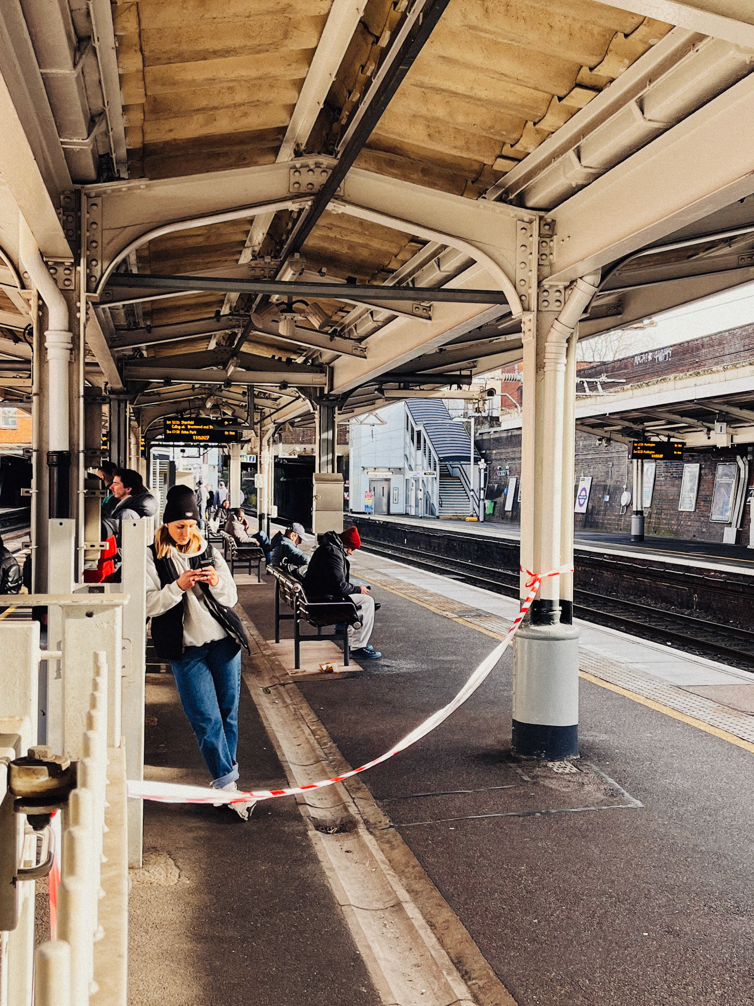 Woman waiting for a train