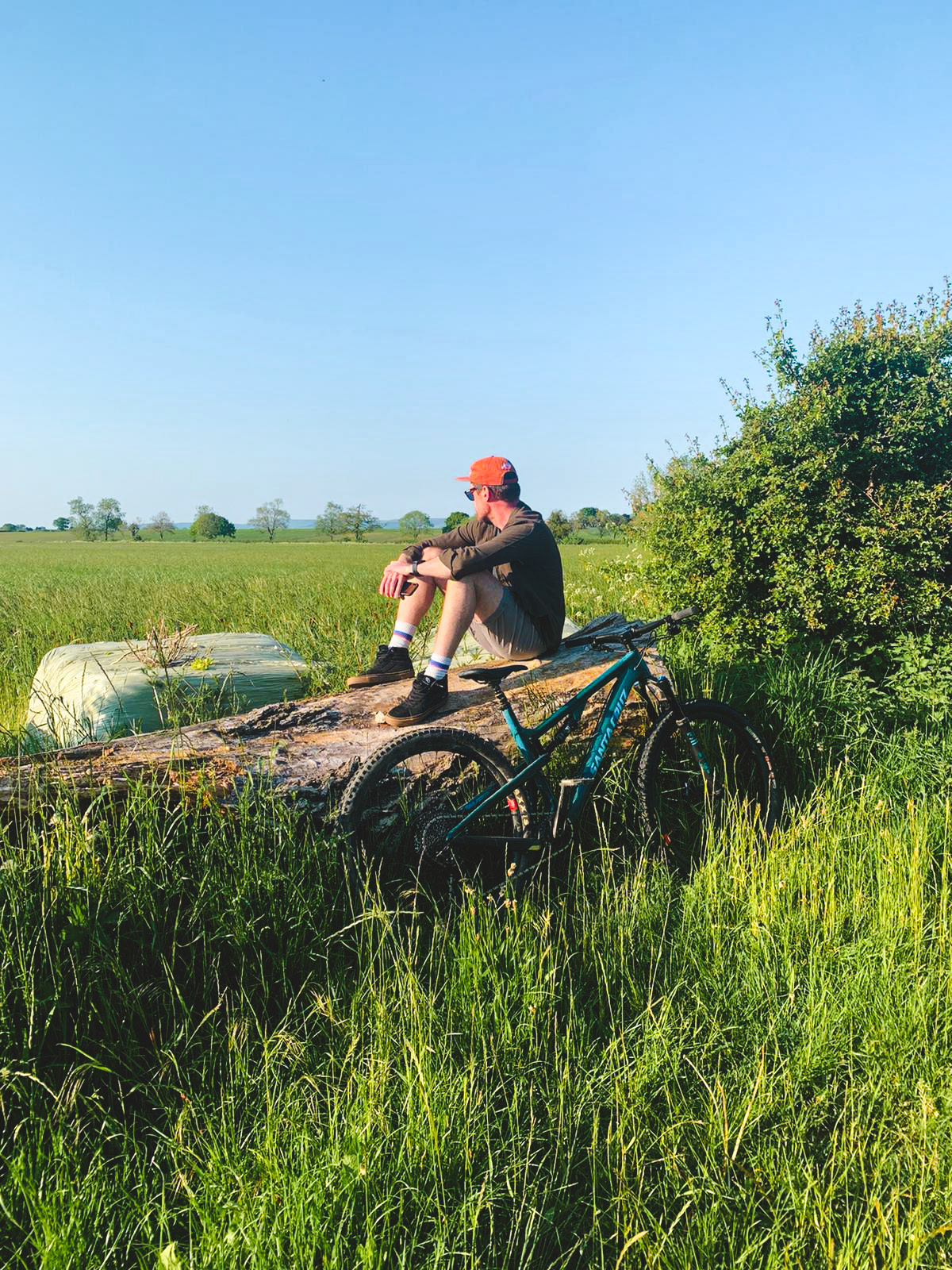Man sitting with mountain bike