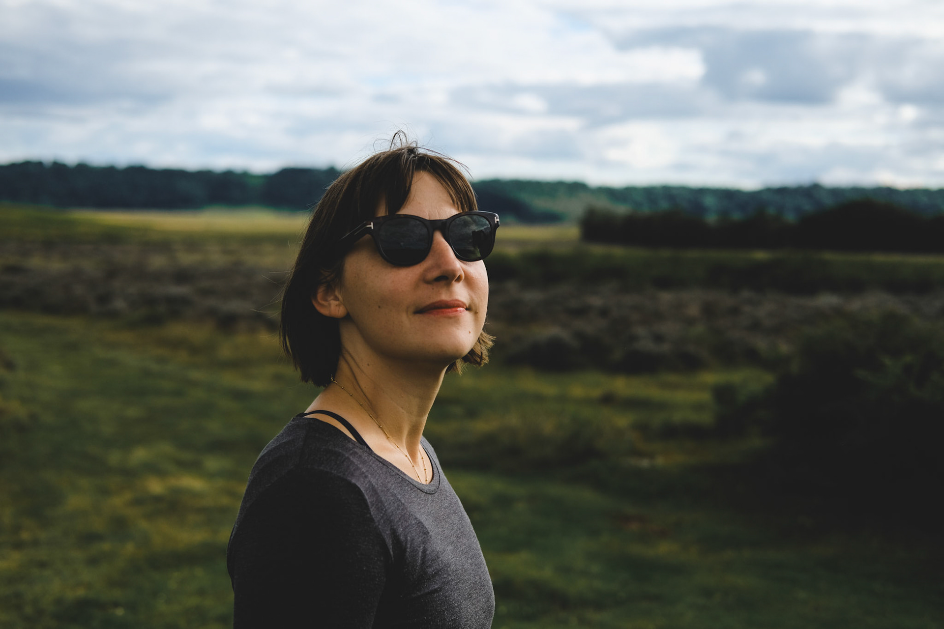 Woman posing outdoors