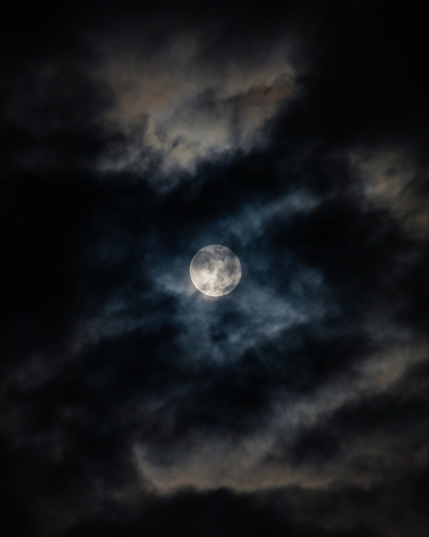 As storm Ciara is busy blowing over the UK, here's a shot of the full moon as seen through the passing storm clouds. Fast moving clouds make for a tricky but (if caught right) rewarding capture!