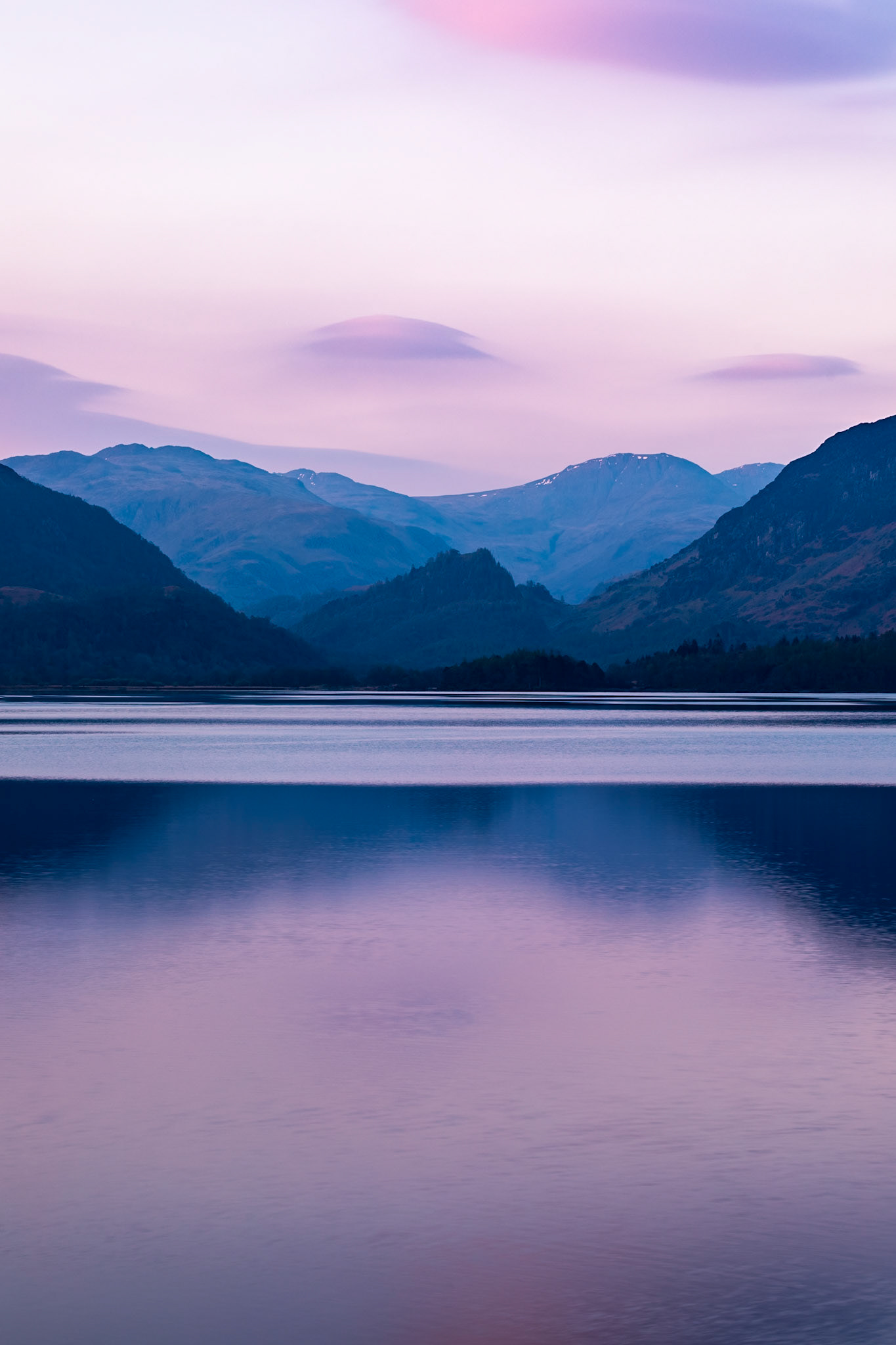 An April sunrise casts beautiful shades of muted pinks and blues over Derwentwater in the Lake District. Such a calm and peaceful scene (if not a bit chilly!)