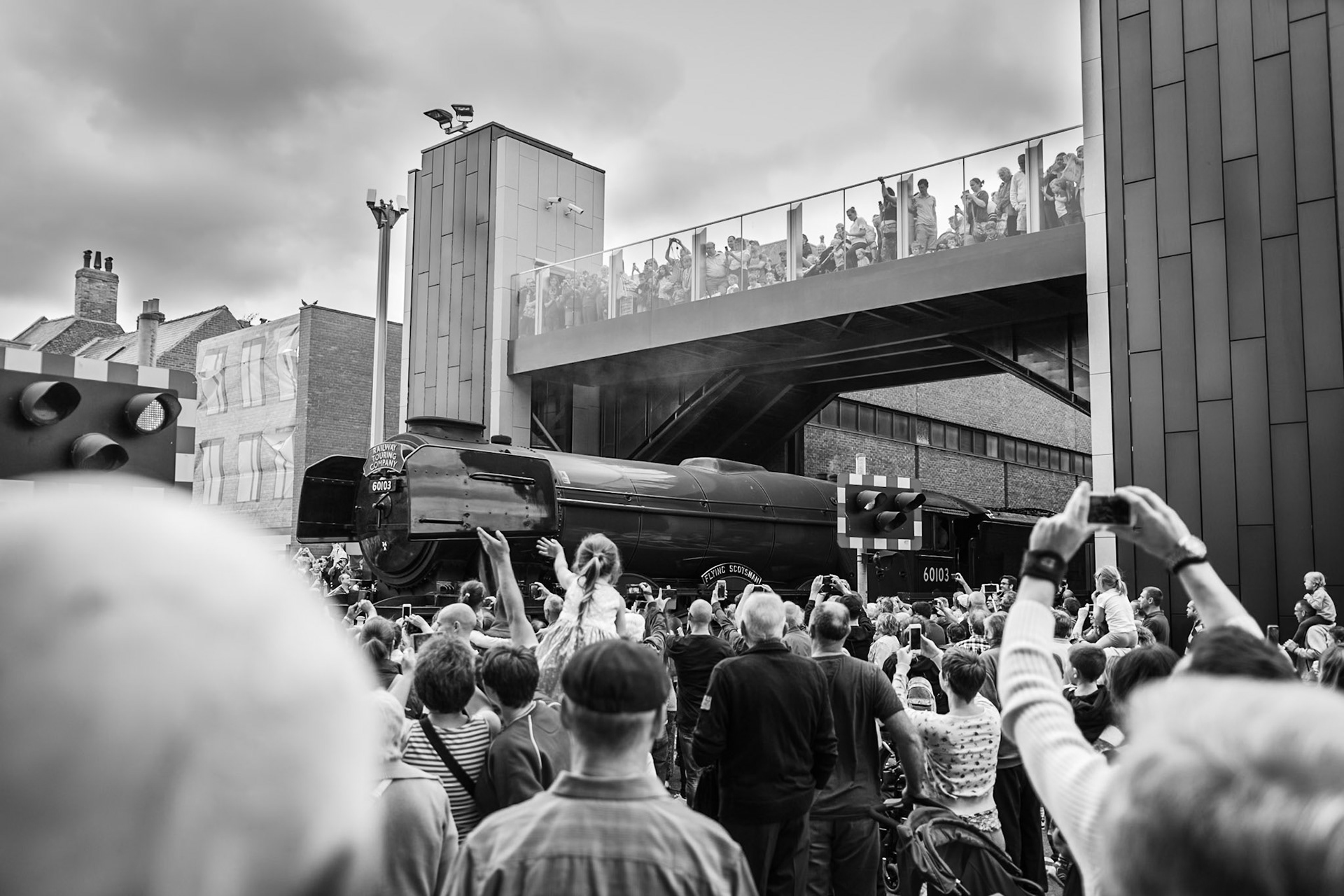 Crowds gather to catch a glimpse of the iconic Flying Scotsman travelling through Lincoln on it's latest tour down to Kings Cross. A magnificent piece of engineering!