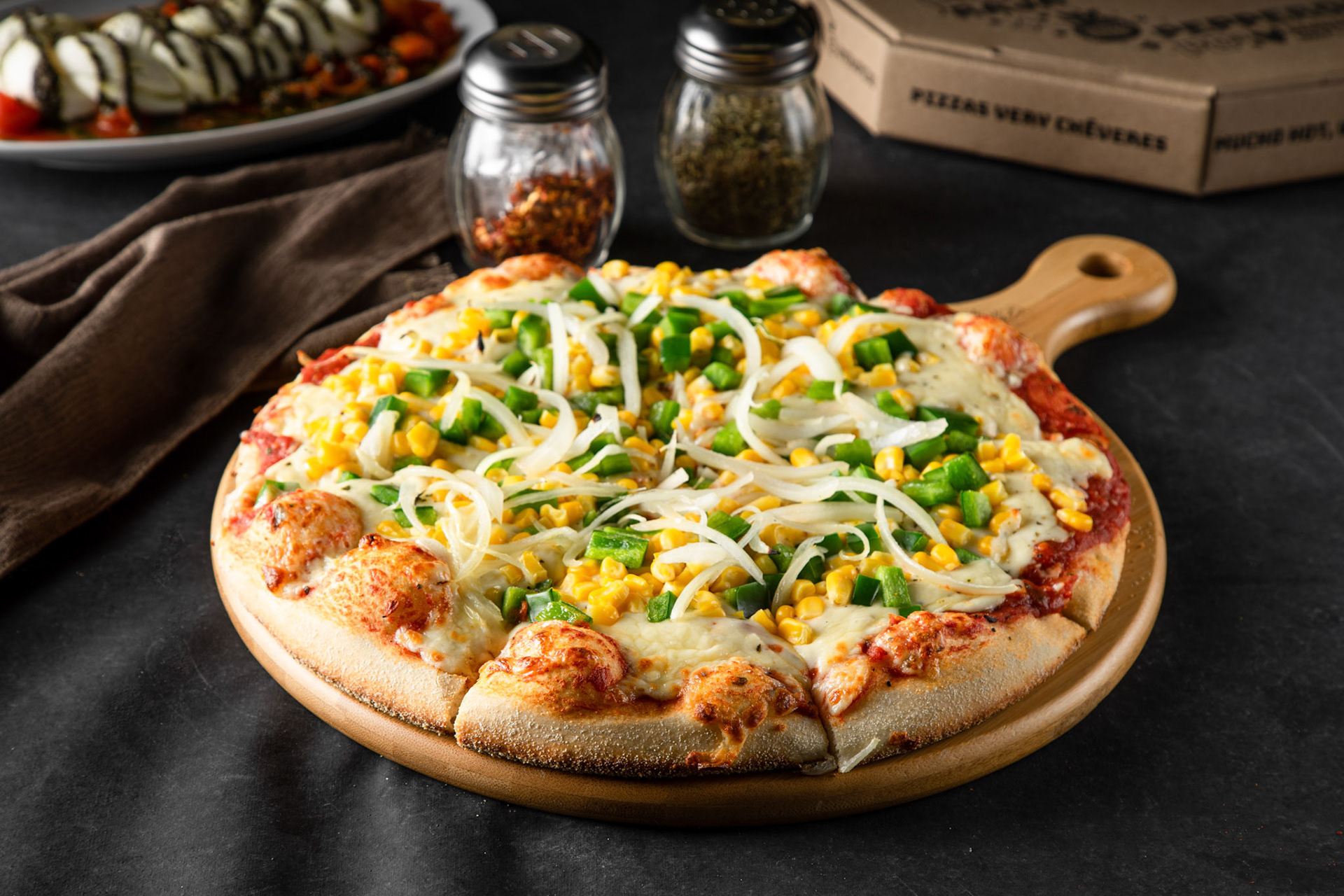 Pizza con vegetales de Veras Pizza, ubicado en Barrio Italia