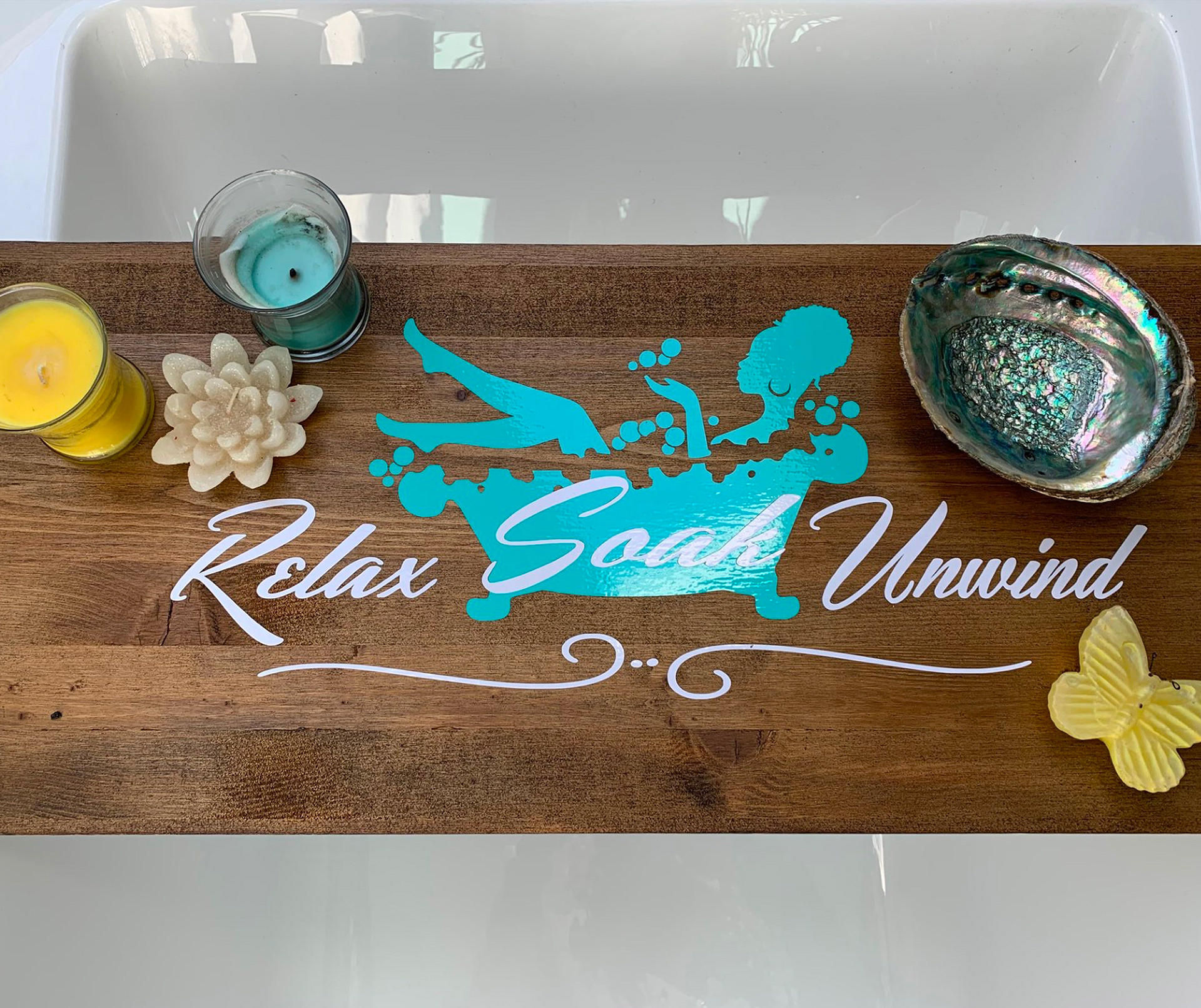 Relax, Soak, Unwind artwork on wooden board for bath tub