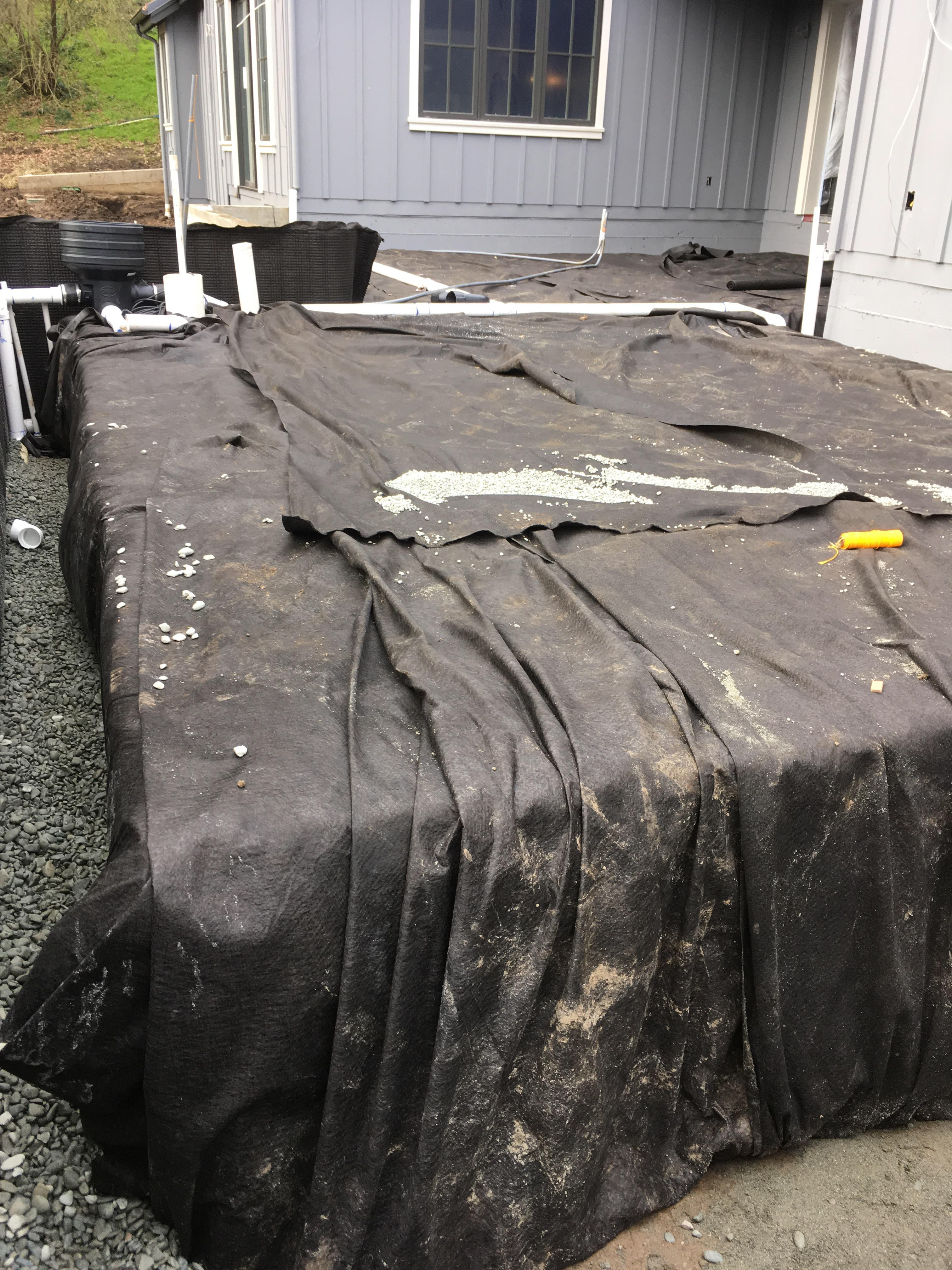 Patio  - tanks wrappped to create holding space